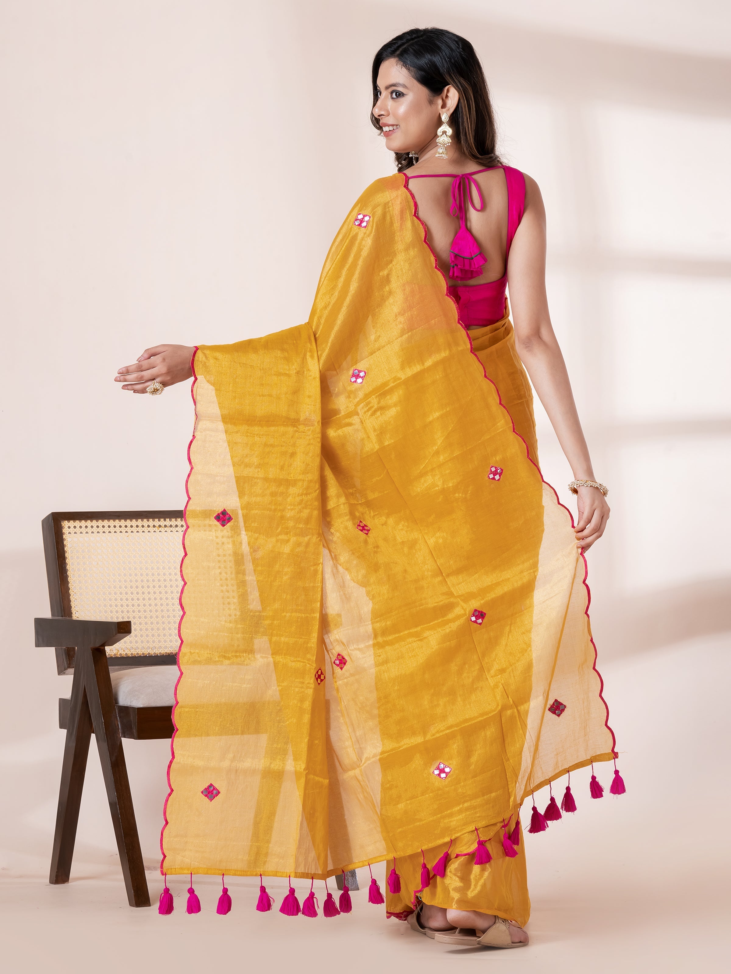 Golden designer tissue saree with elegant zari motifs by Shop AaMe