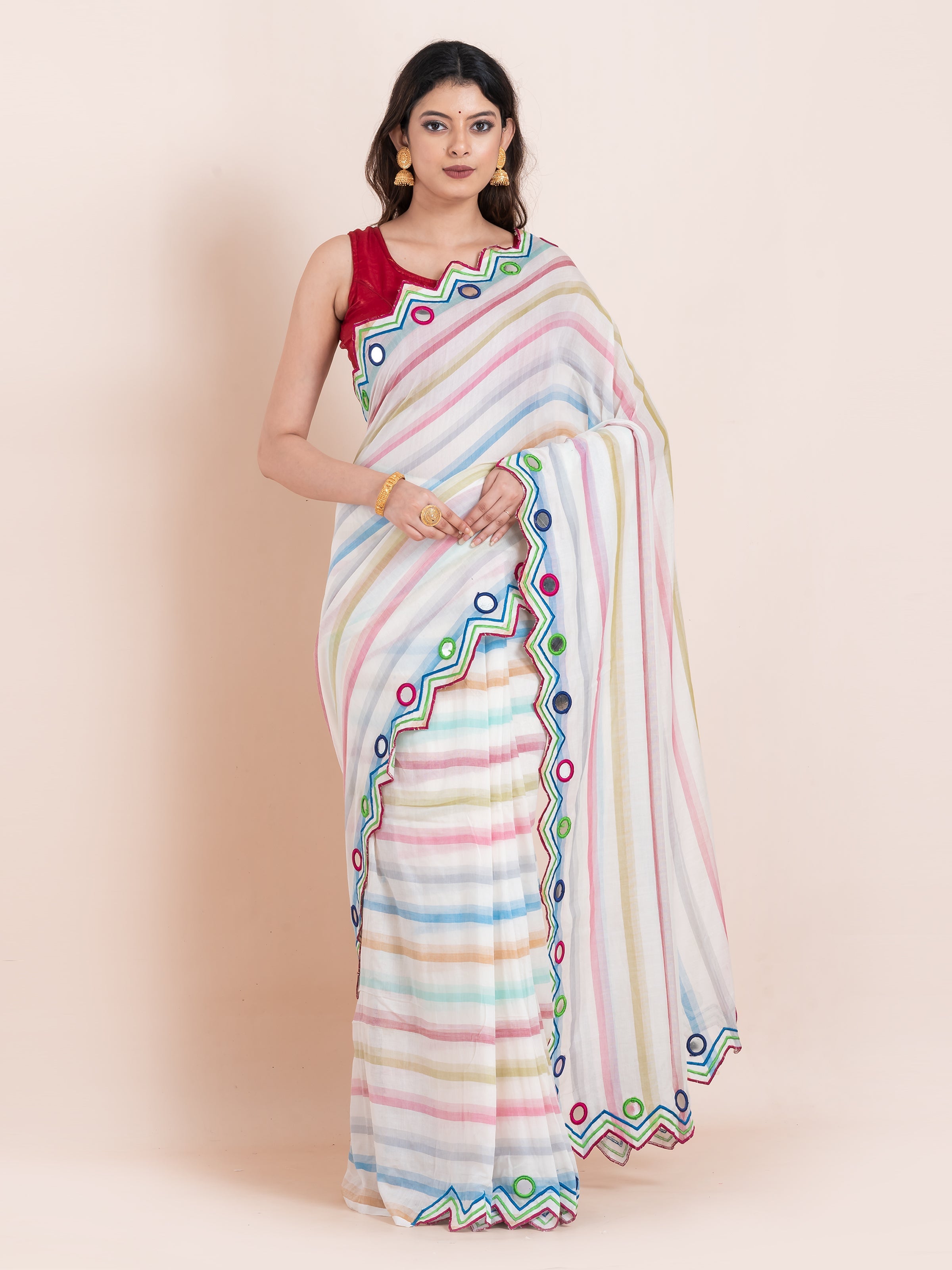 White Reflection saree featuring lightweight fabric and graceful mirror embellishments
