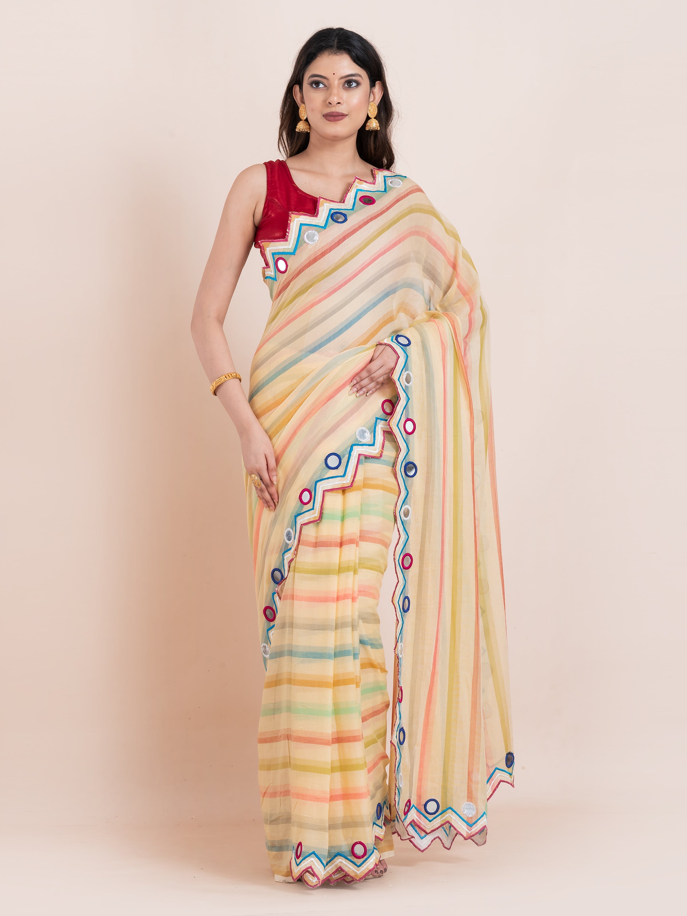Lightweight lime yellow mulmul cotton saree by Shopaame with mirror embroidery and multicolored stripes.