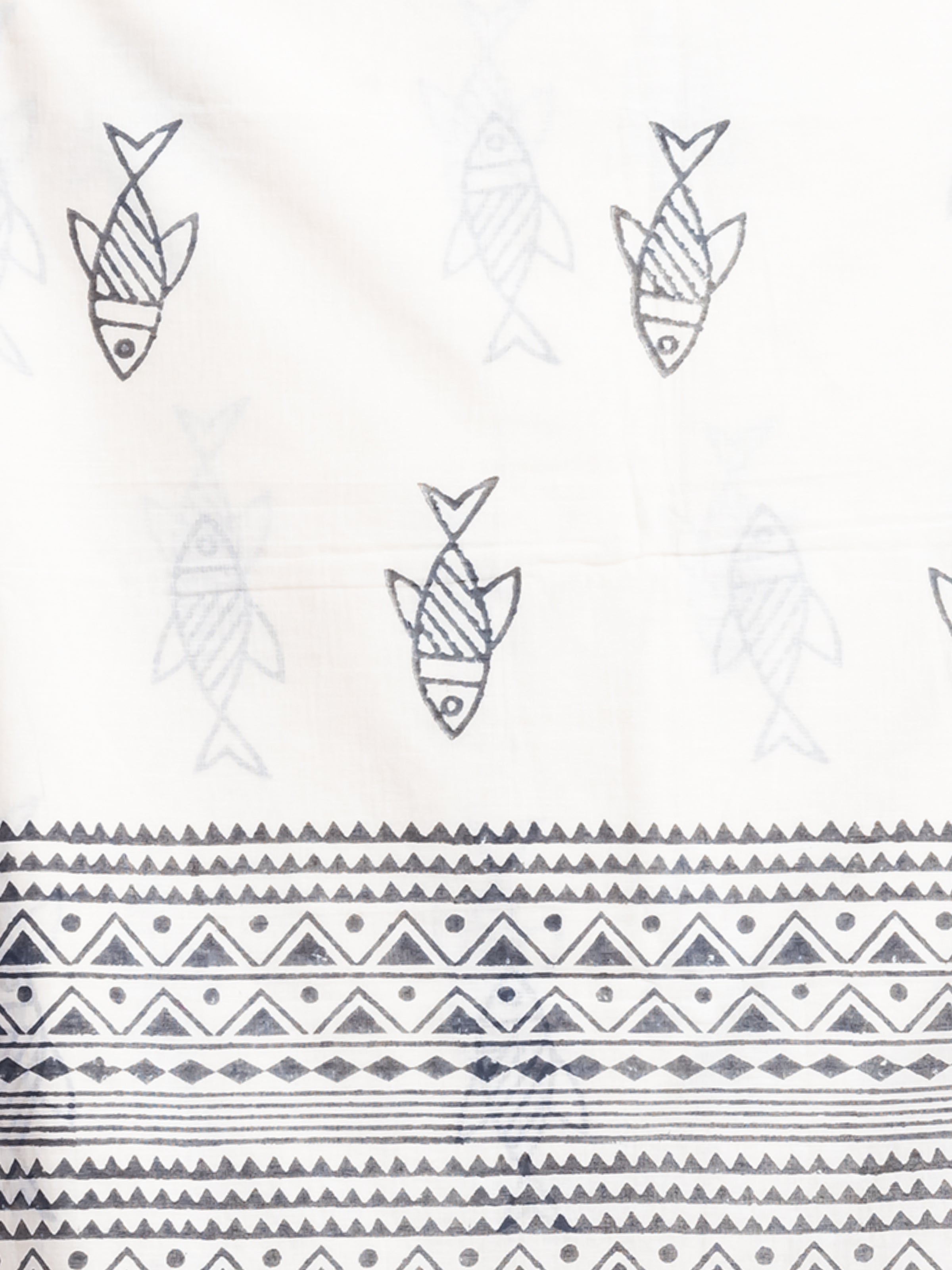 Close-up of Matsya white khadi cotton saree by ShopAaMe highlighting intricate hand block print details