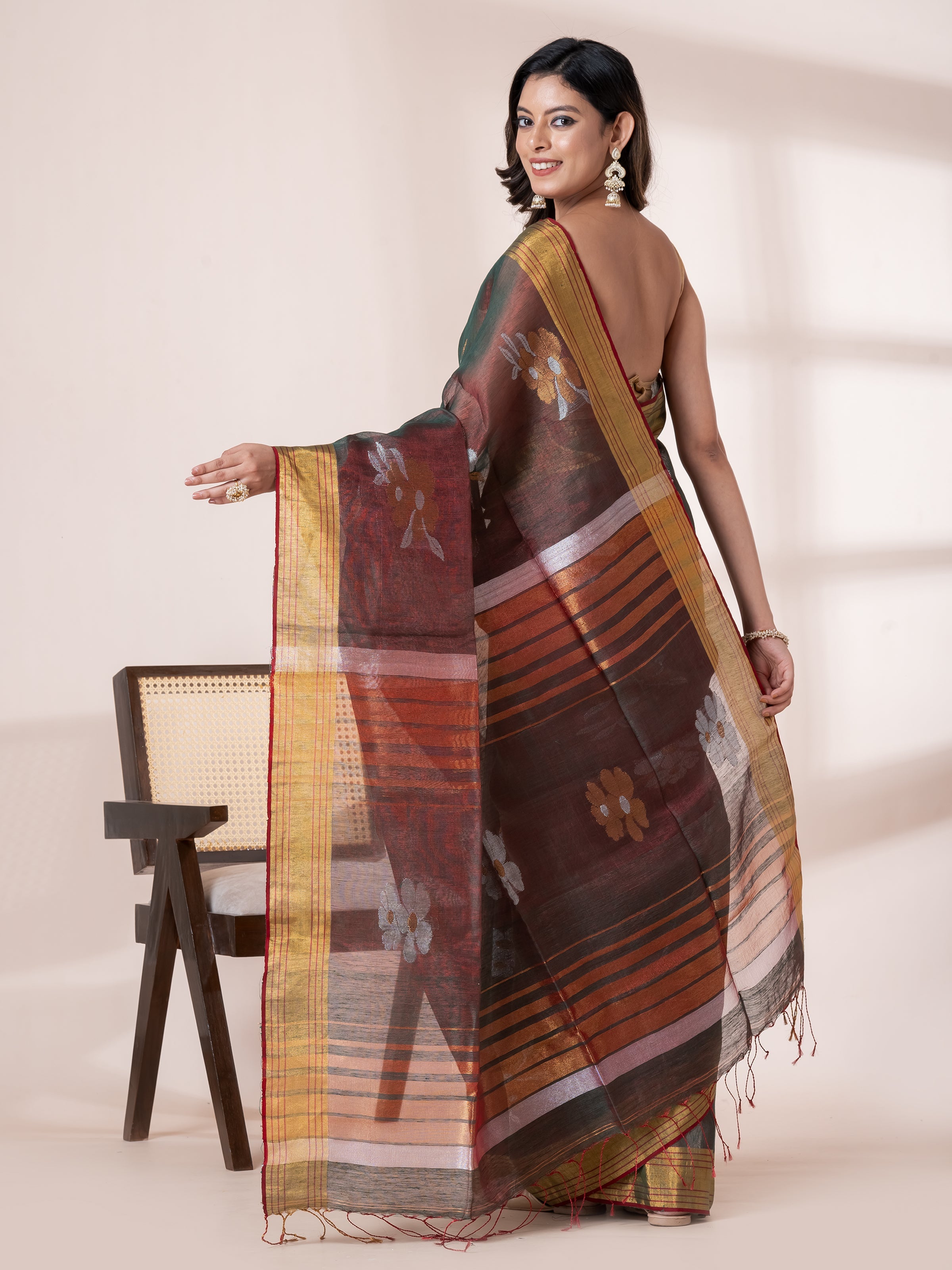 Green golden designer tissue saree with refined zari detailing by Shop AaMe