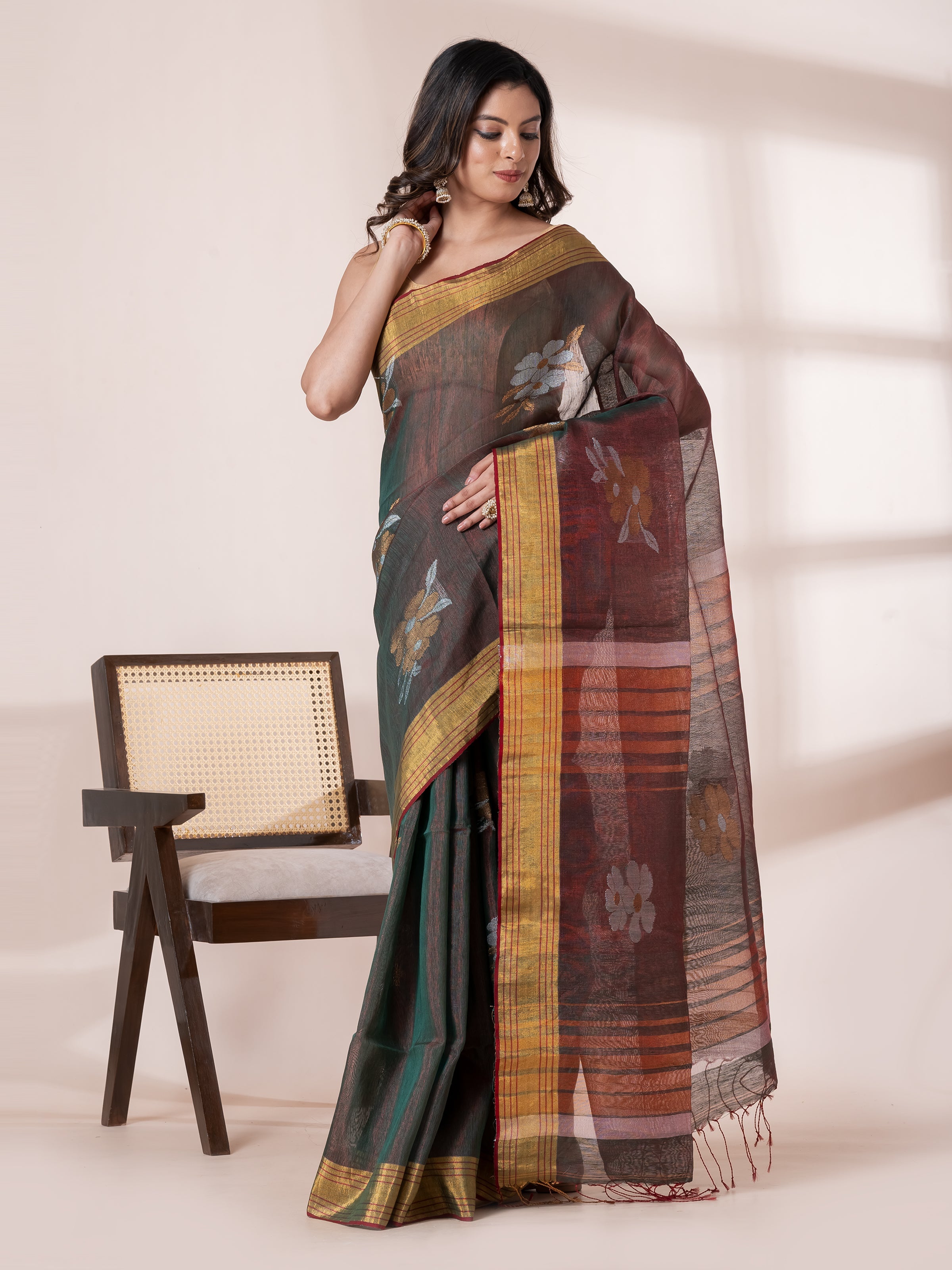 Shop AaMe Lavanya saree in elegant green and golden tissue fabric