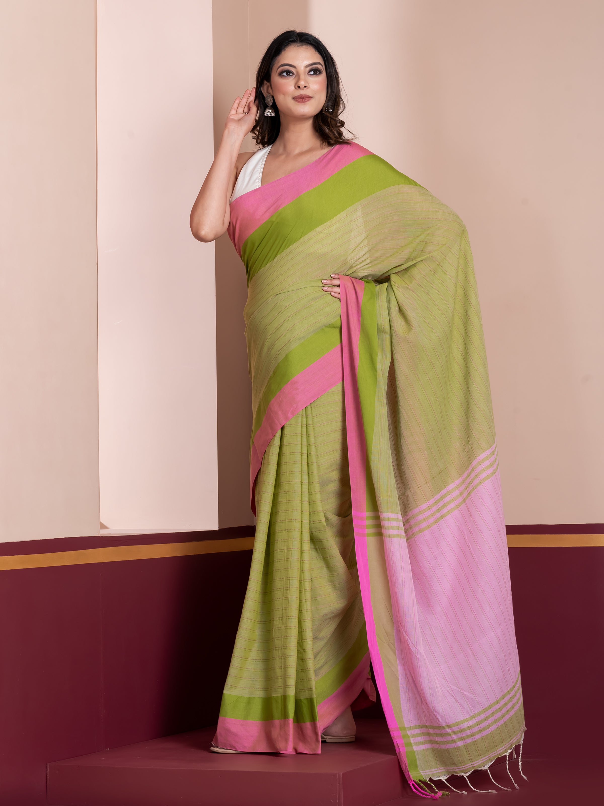 ShopAaMe Nanibala khadi cotton saree showcasing vibrant green and pink hues with handcrafted appeal