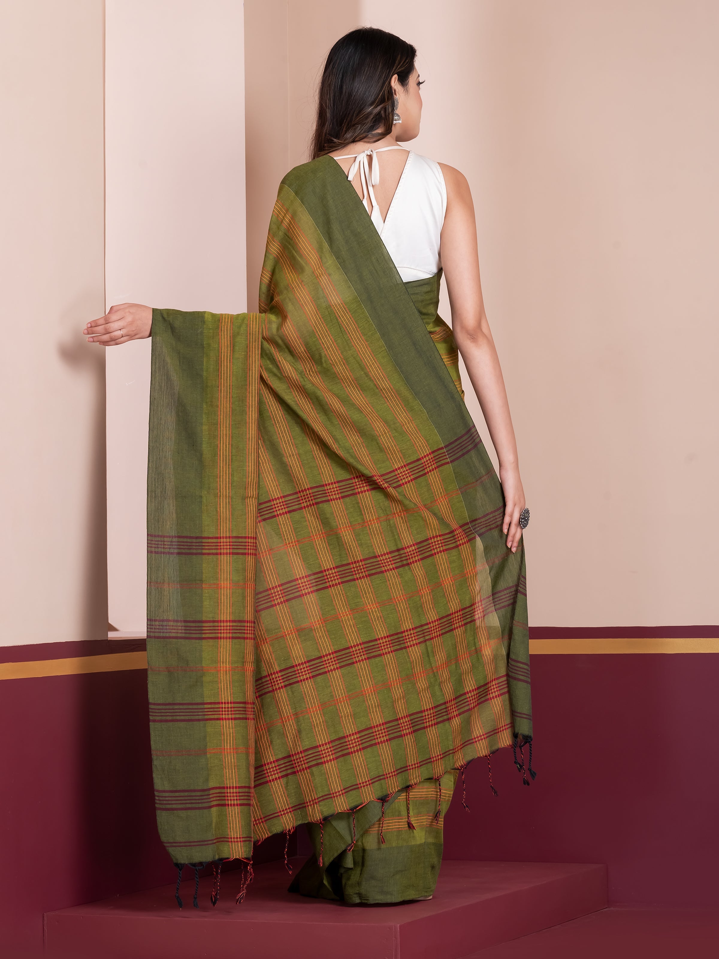 Green striped khaadi cotton saree with breathable fabric by Shop AaMe