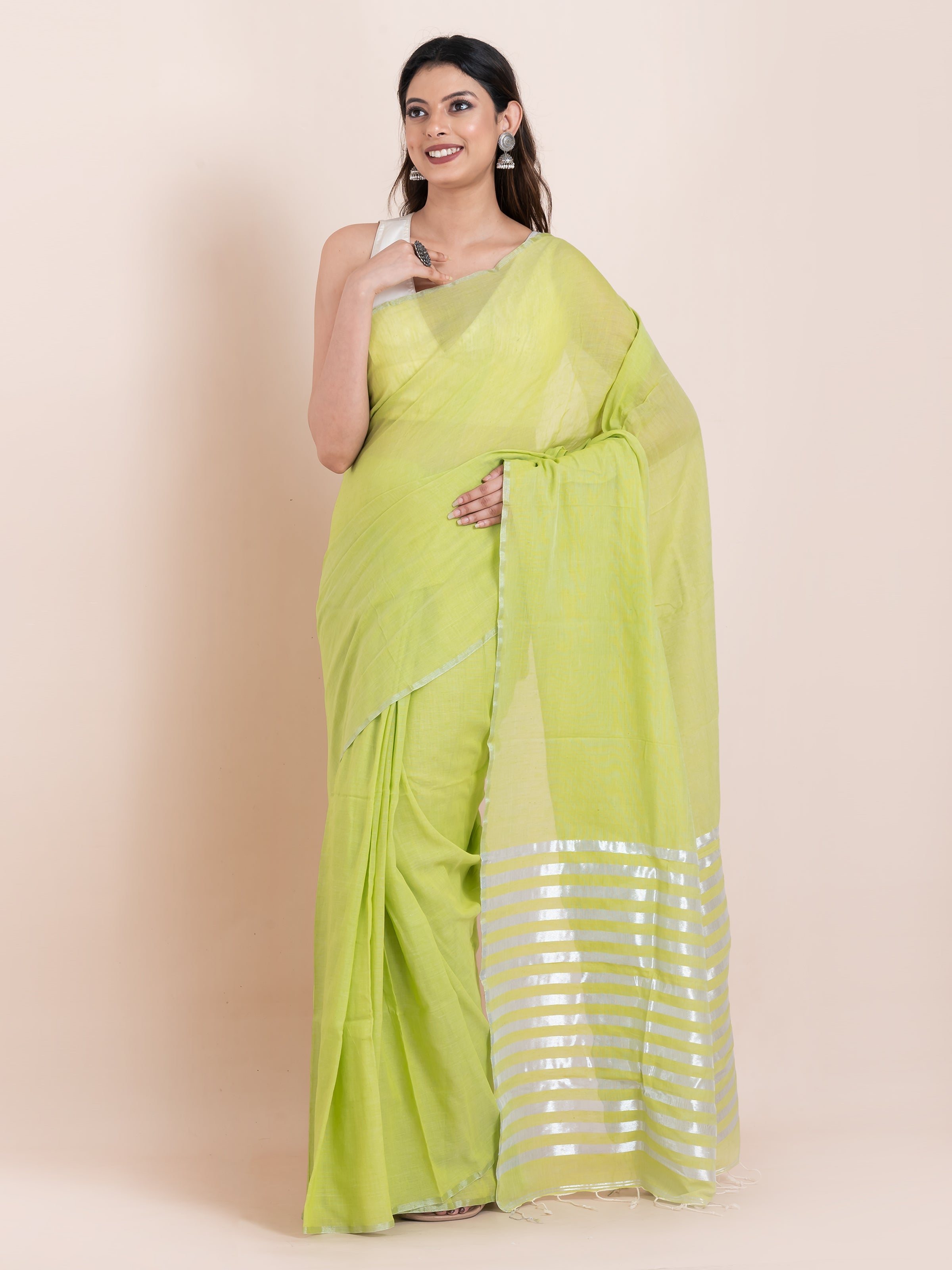 Lush Green khaadi cotton saree featuring a comfortable everyday drape