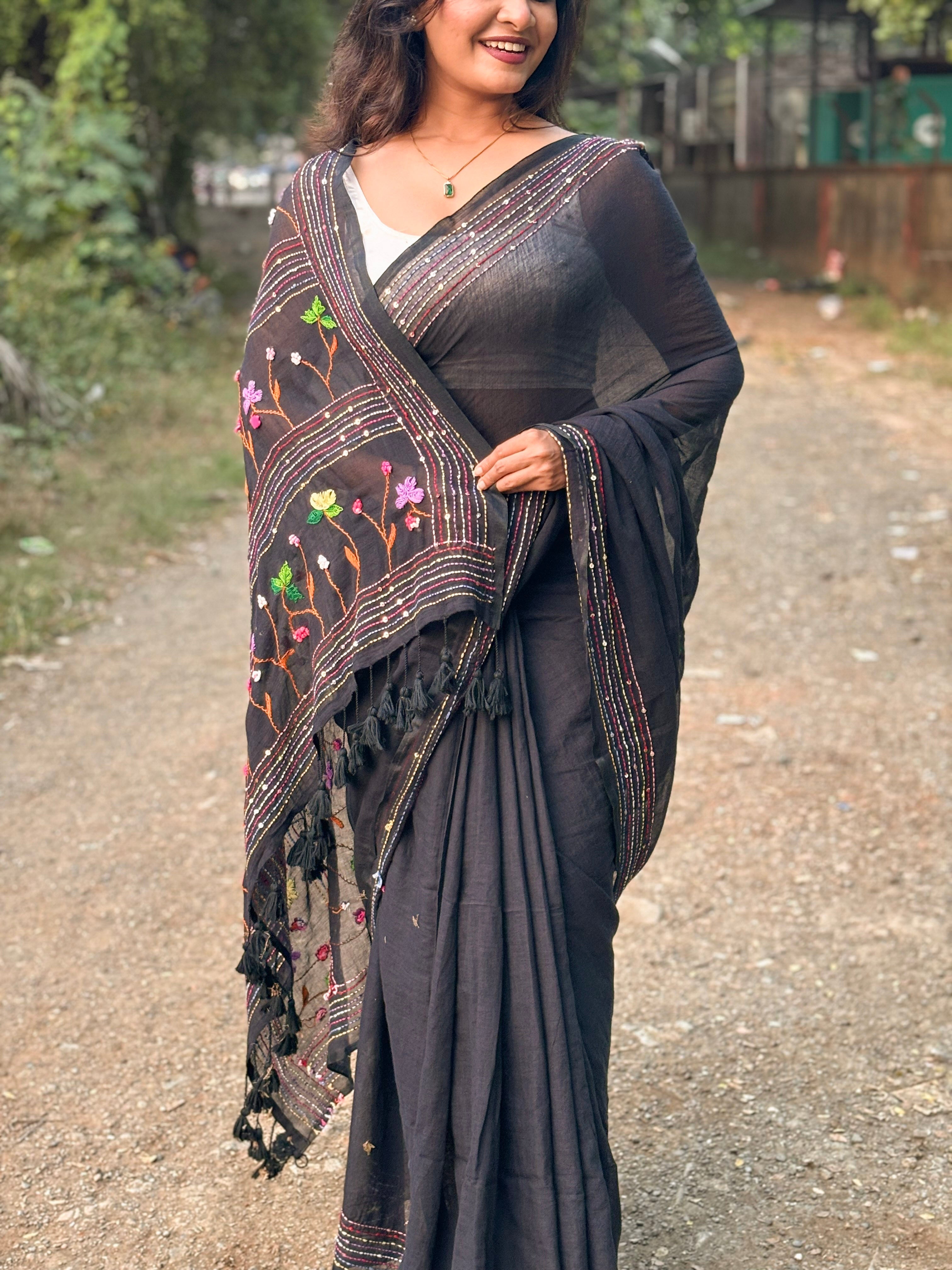 Noir Petal Nocturne black embroidered mulmul saree with elegant handcrafted detailing