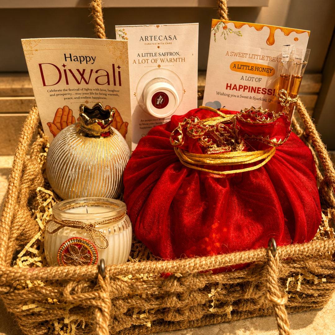Utsav Jute Net Festive Gift Basket | Red Potli, Pomegranate & Soy Wax Candle - https://artecasa.in/