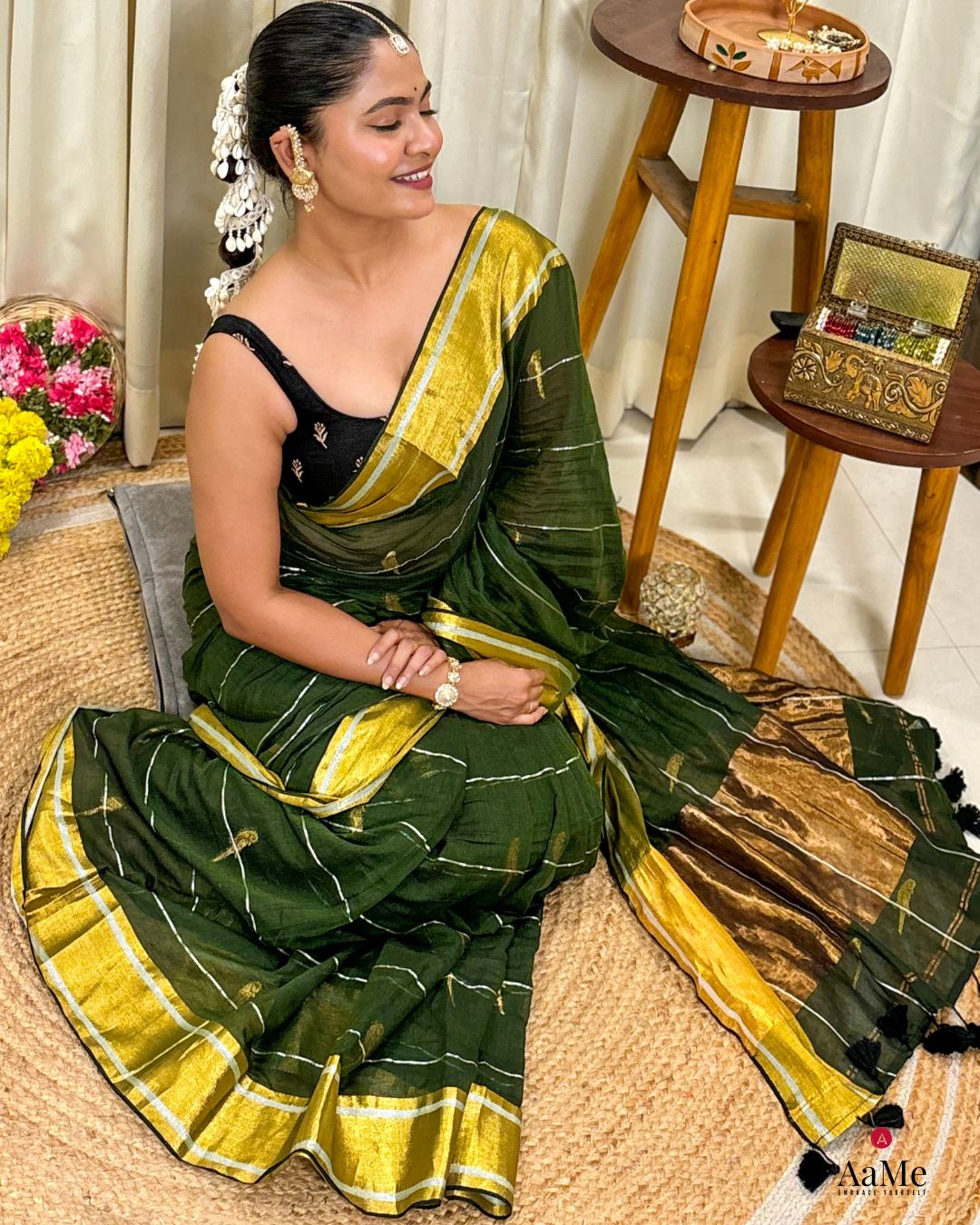 Handwoven green mulmul cotton saree from ShopAaMe showcasing light and airy summer fabric