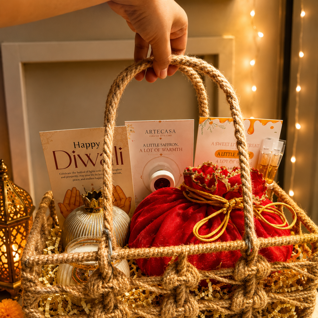 Utsav Jute Net Festive Gift Basket | Red Potli, Pomegranate & Soy Wax Candle - https://artecasa.in/