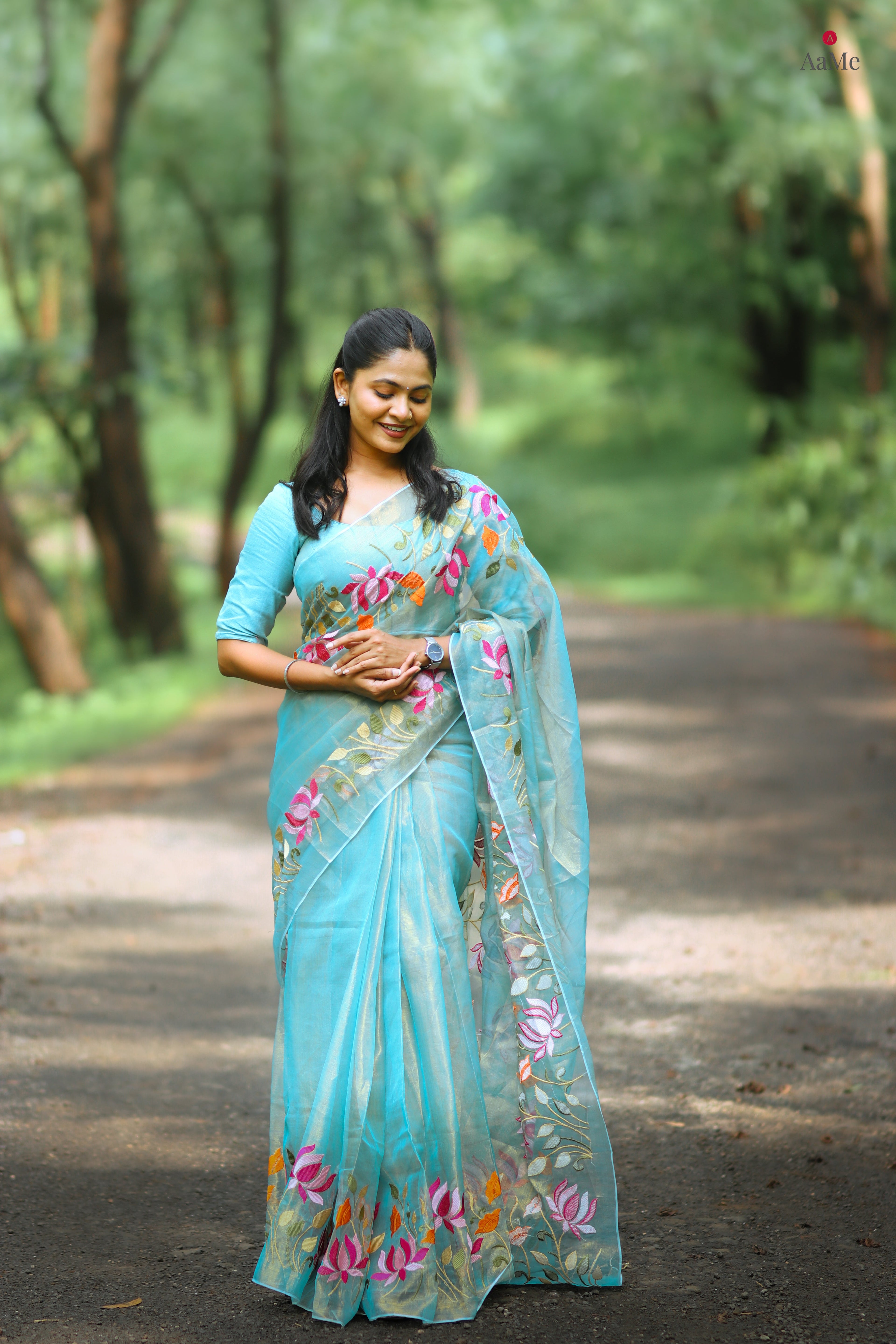 Blue viral tissue saree with floral embroidery orange and pink