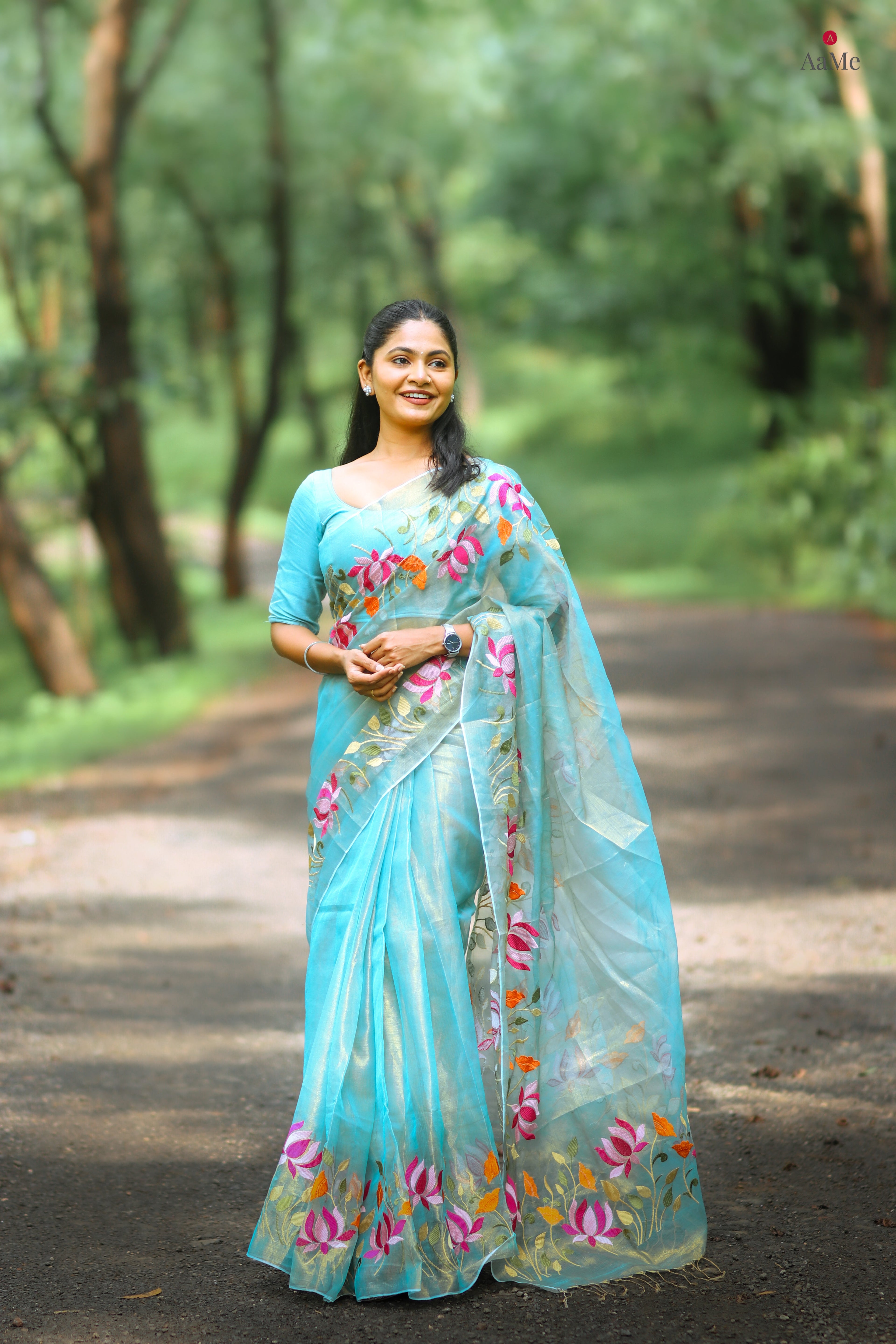 Blue viral tissue saree with floral embroidery orange and pink