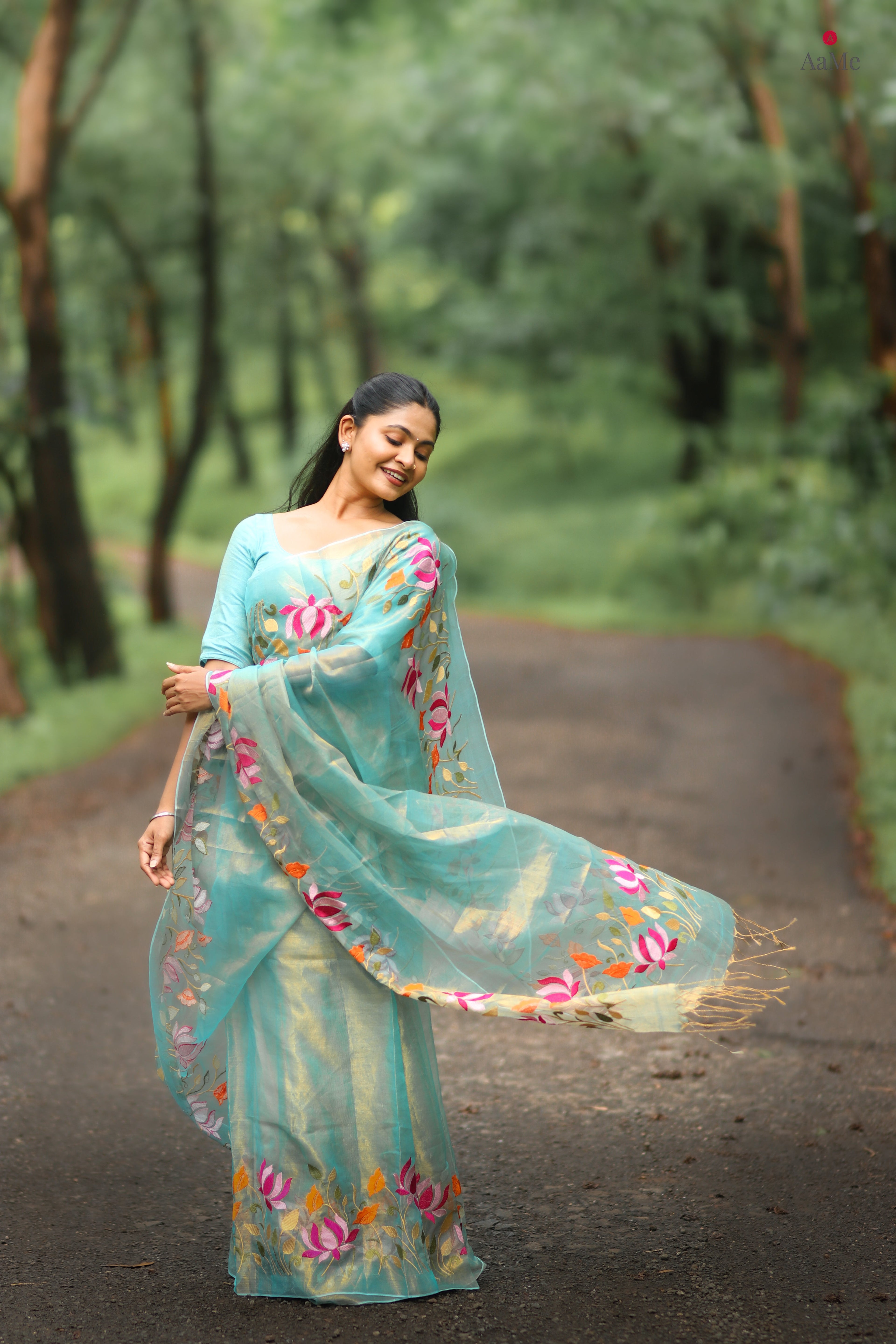 Blue viral tissue saree with floral embroidery orange and pink