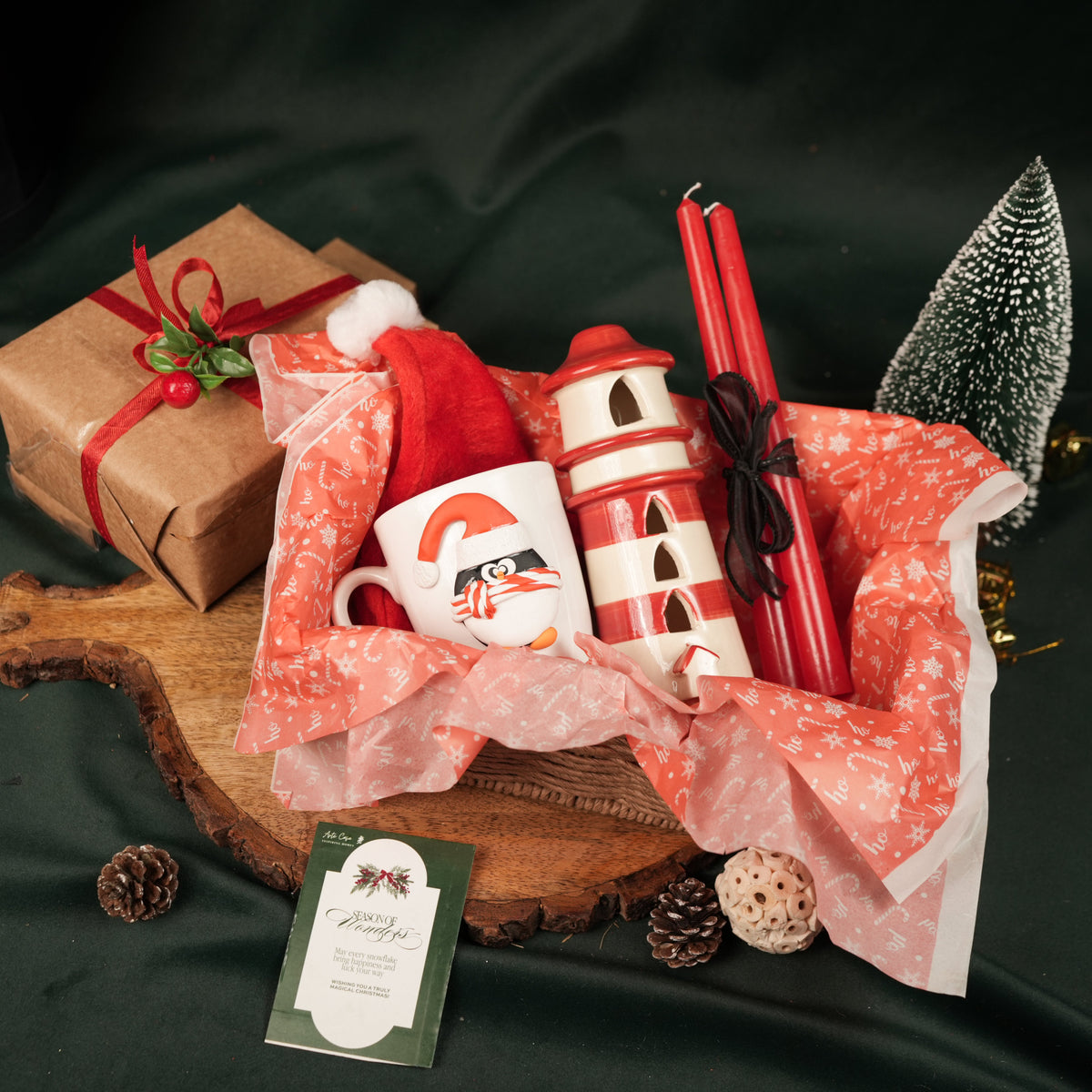 Santa Merry Magic Set – Christmas Gift Hamper with Penguin Mug, Santa Cap, Candles & Tealight House | Premium Festive Gift Box India - https://artecasa.in/
