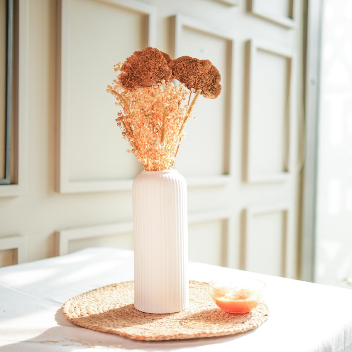 Golden harvest bunch with snow white vase - https://artecasa.in/