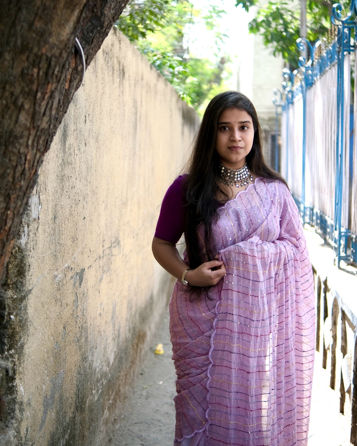 Shop AaMe purple mulmul cotton saree with graceful embroidery for festive styling