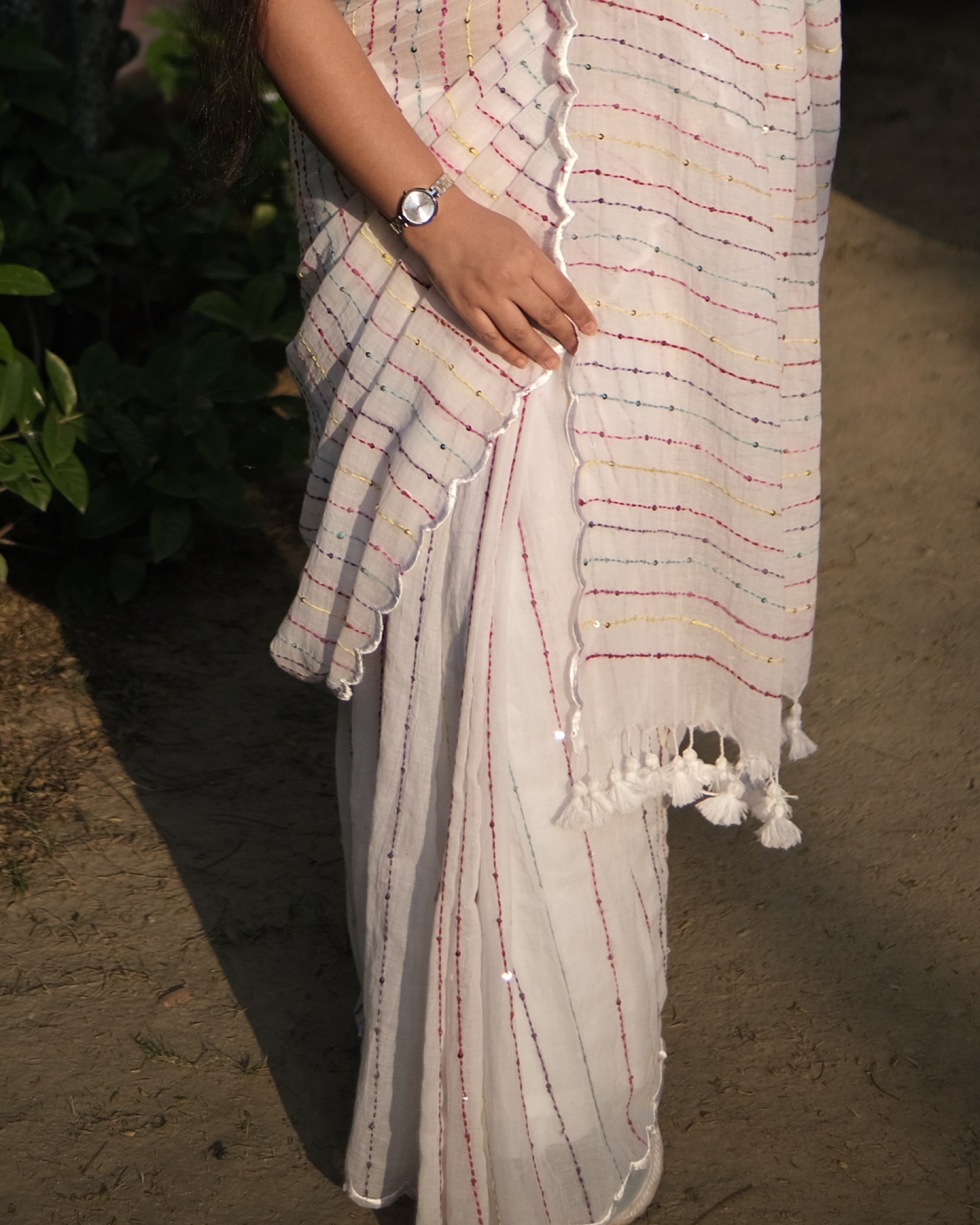White mulmul cotton saree with kantha and sequins embroidery, a breathable saree for festive occasions and warm days.