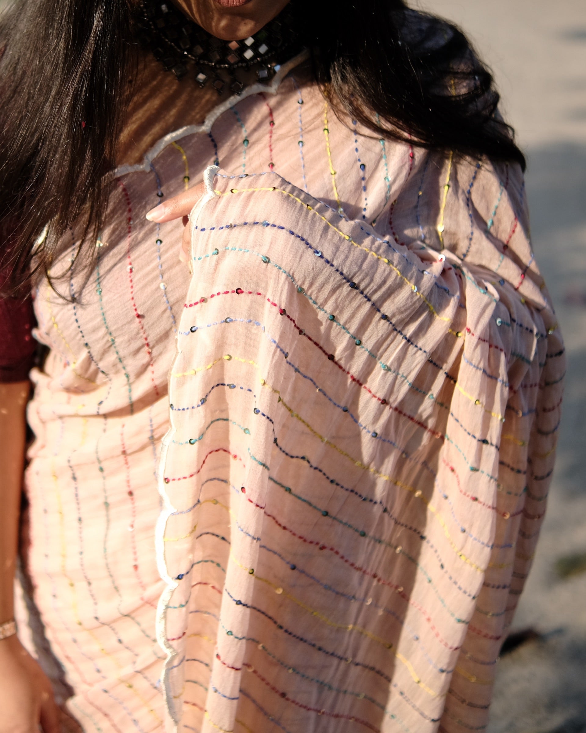 Ivory Sky cotton saree, handcrafted with fine embroidery for a breathable and graceful look.
