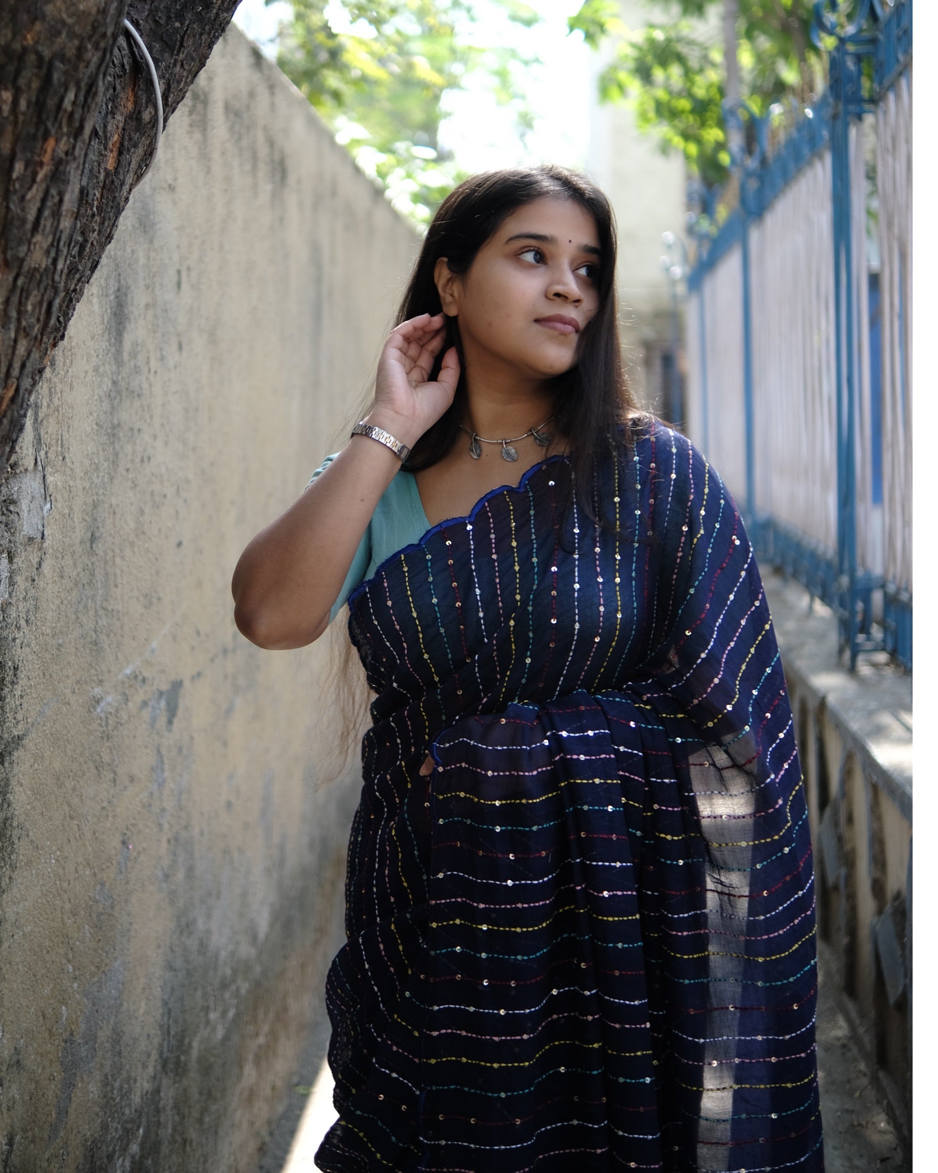 Soft and comfortable mulmul cotton saree with multicoloured embroidery in Kantha Stitch embellished with sequins perfect for party or festive occasion in navy blue