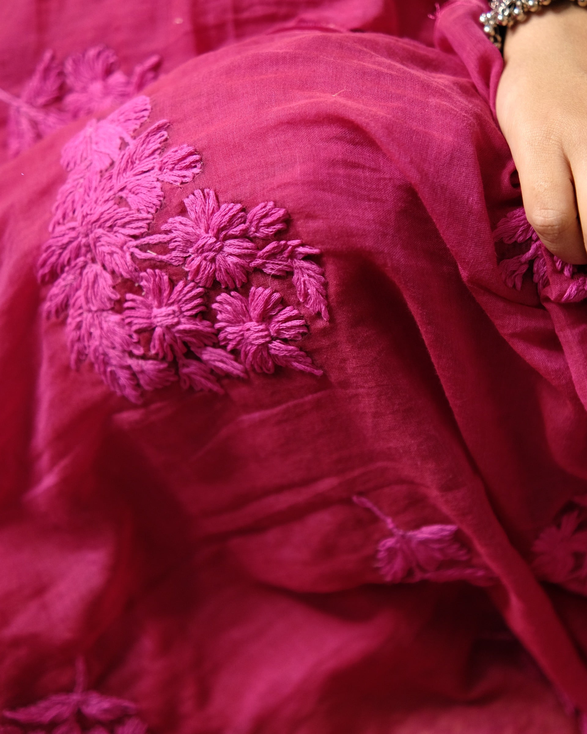 Soft and Comfortable mulmul cotton saree with Chikankari machine work and cutwork border in self tones of Rani hot pink