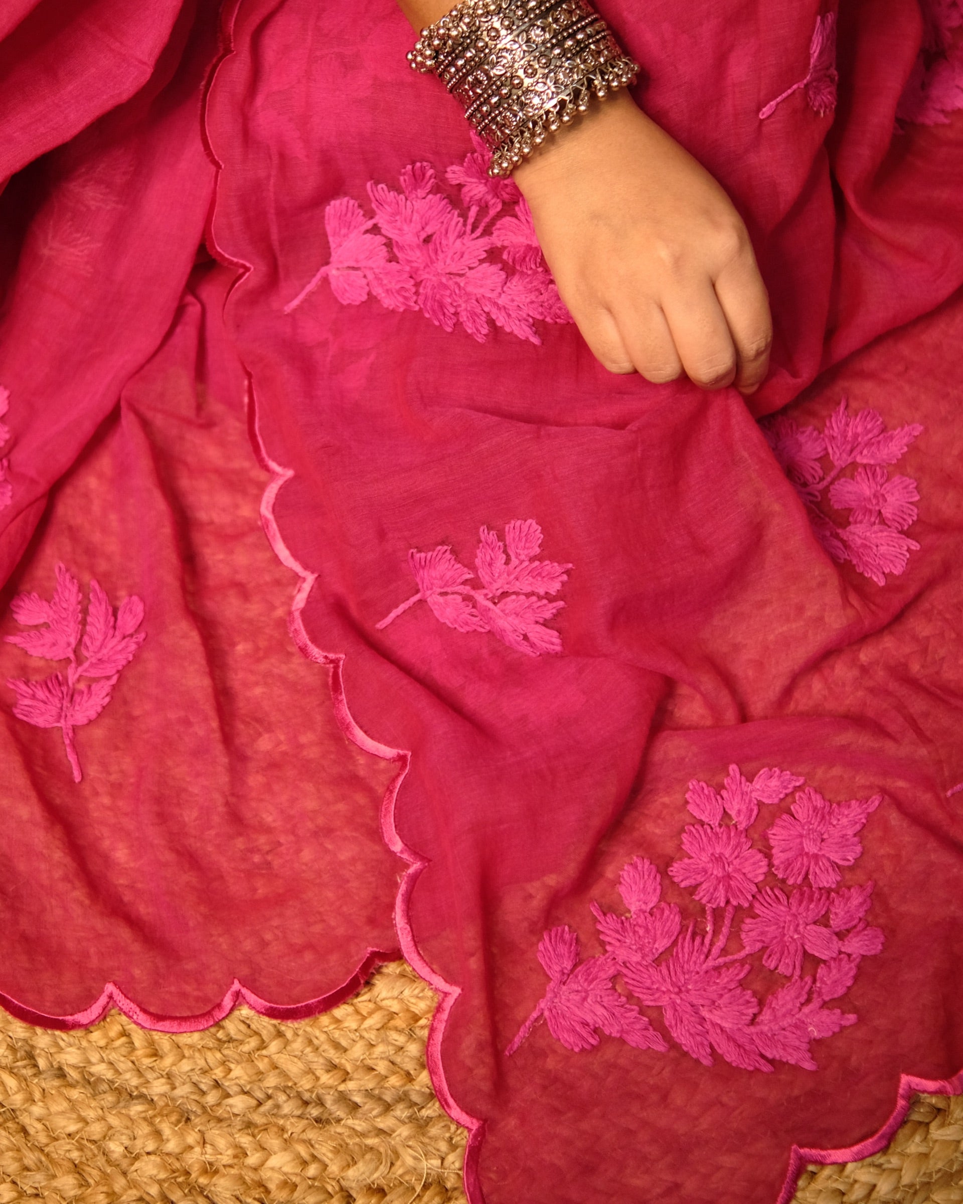 Soft and Comfortable mulmul cotton saree with Chikankari machine work and cutwork border in self tones of Rani hot pink
