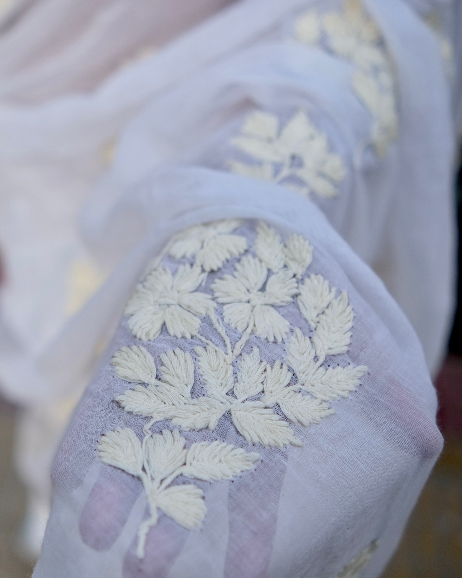 Soft and Comfortable mulmul cotton saree with Chikankari machine work and cutwork border in self tones of White