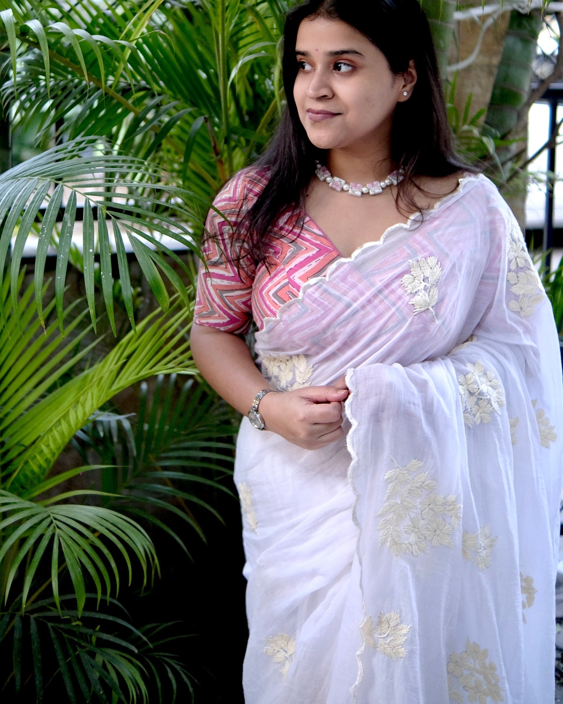 Soft and Comfortable mulmul cotton saree with Chikankari machine work and cutwork border in self tones of White