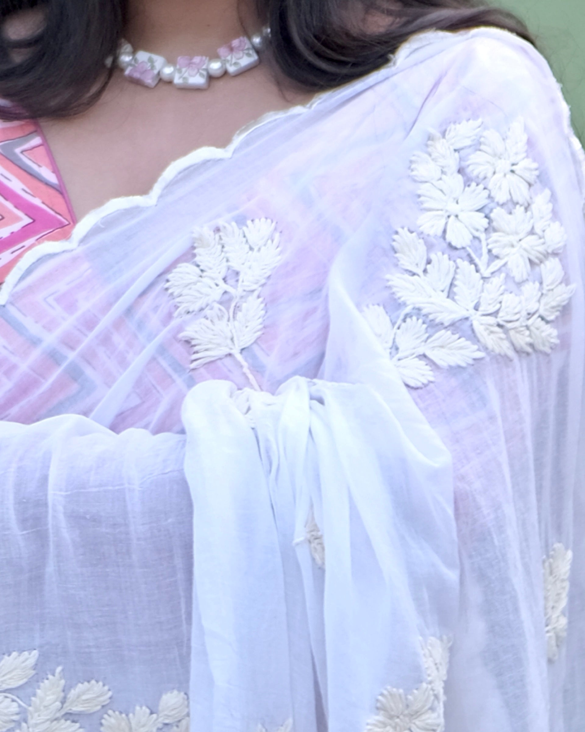 Soft and Comfortable mulmul cotton saree with Chikankari machine work and cutwork border in self tones of White