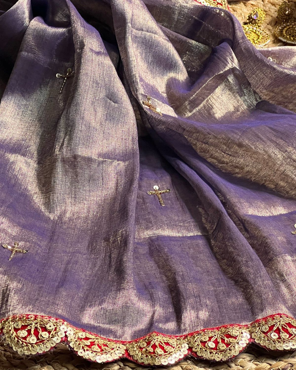 Designer purple zardozi saree with lightweight festive styling for parties and ethnic wear