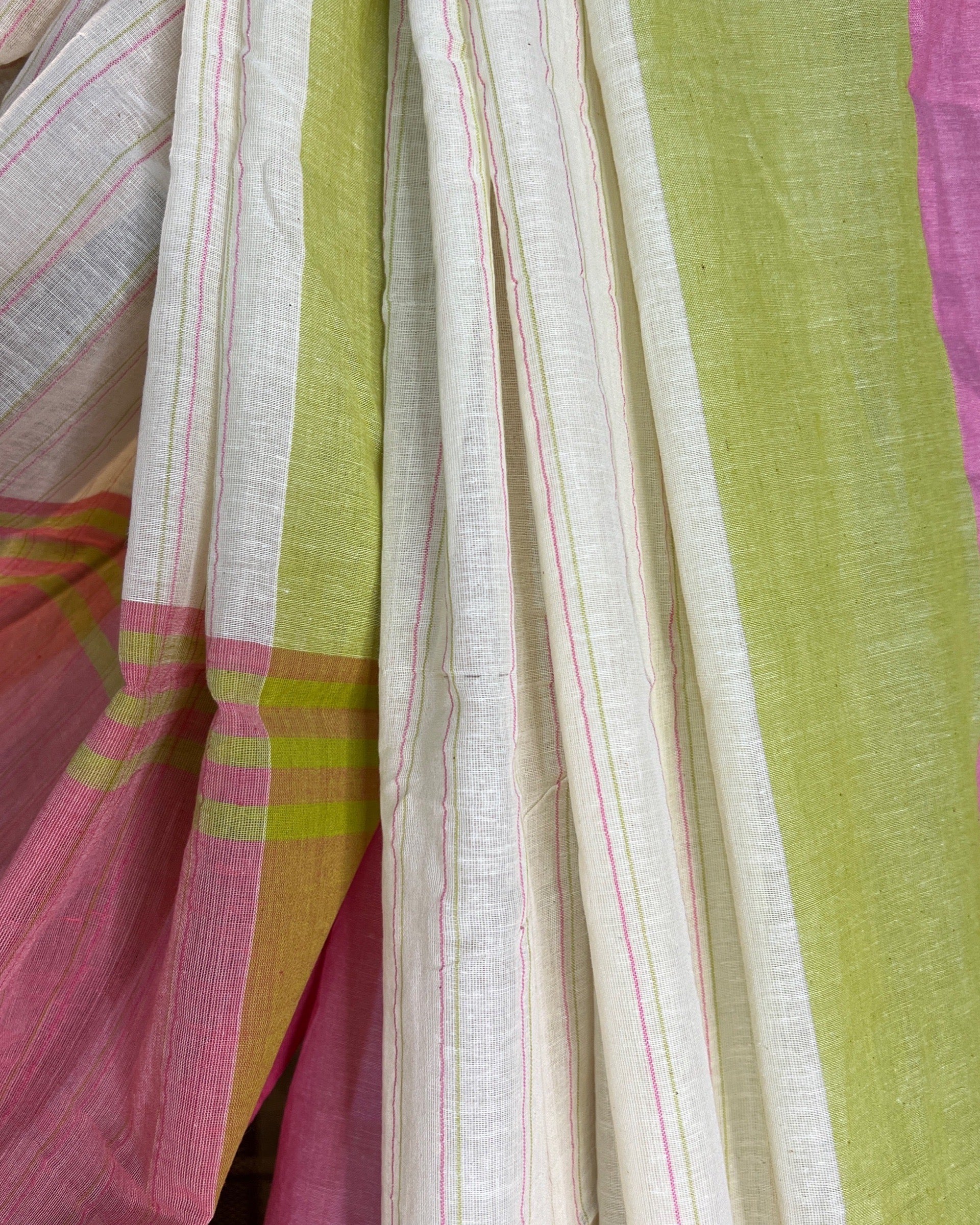 Close-up of Kadambini mustard khadi cotton saree by ShopAaMe highlighting its woven details and rich mustard hue