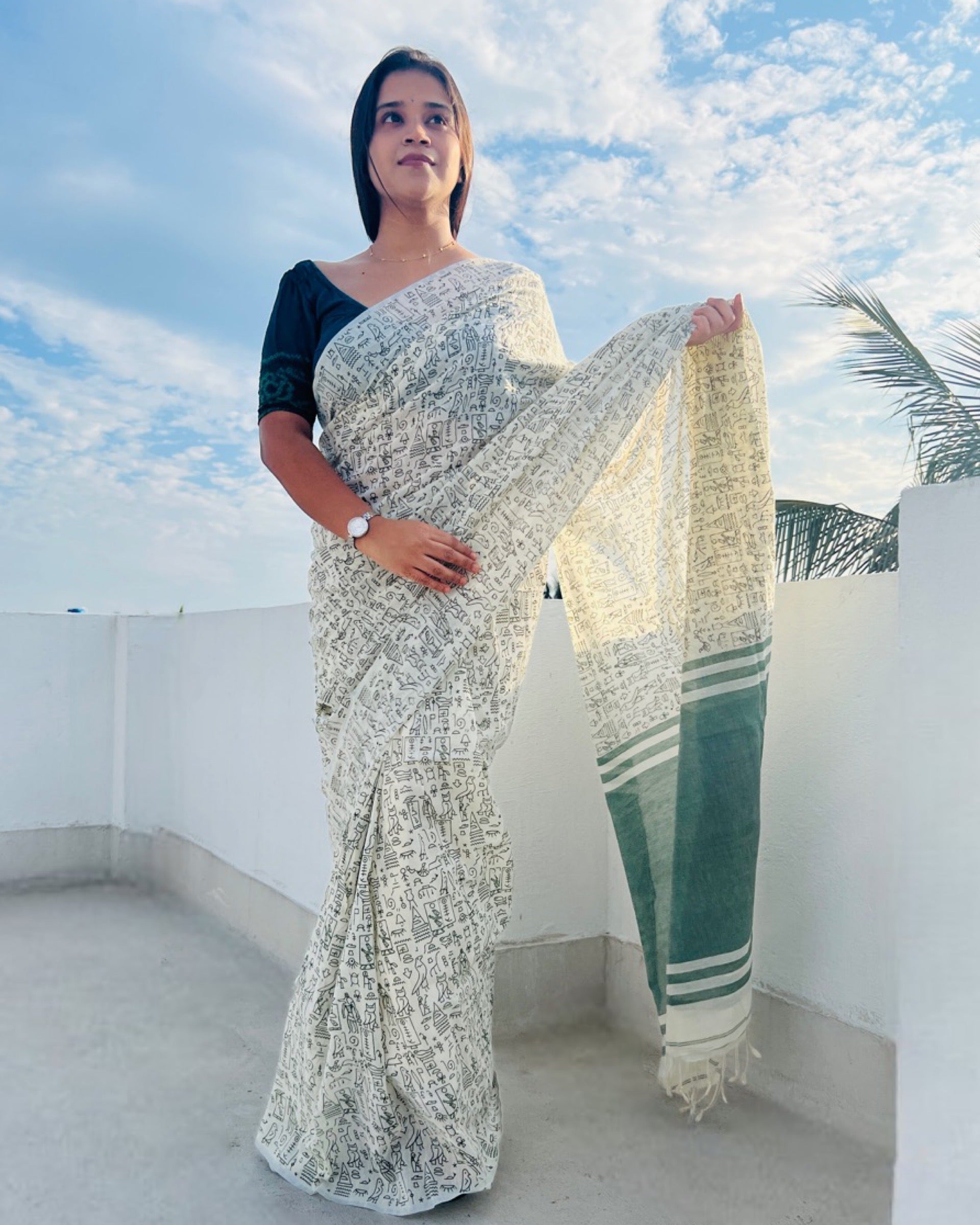 Off white soft and comfortable khadi cotton saree from ShopAaMe printed in green itsy bitsy patterns
