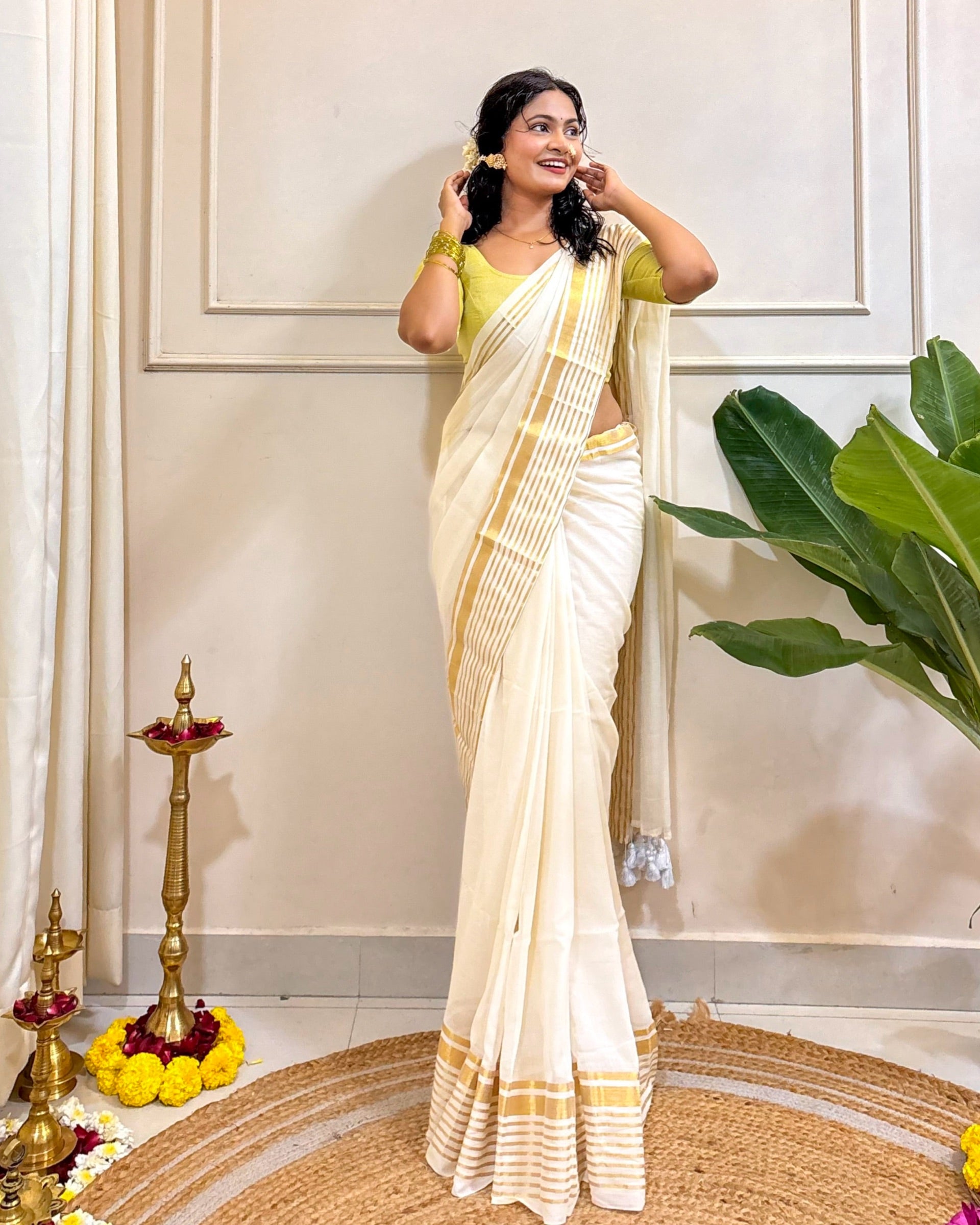 Kasavu Dreams white saree crafted with breathable fabric and Kerala-inspired styling