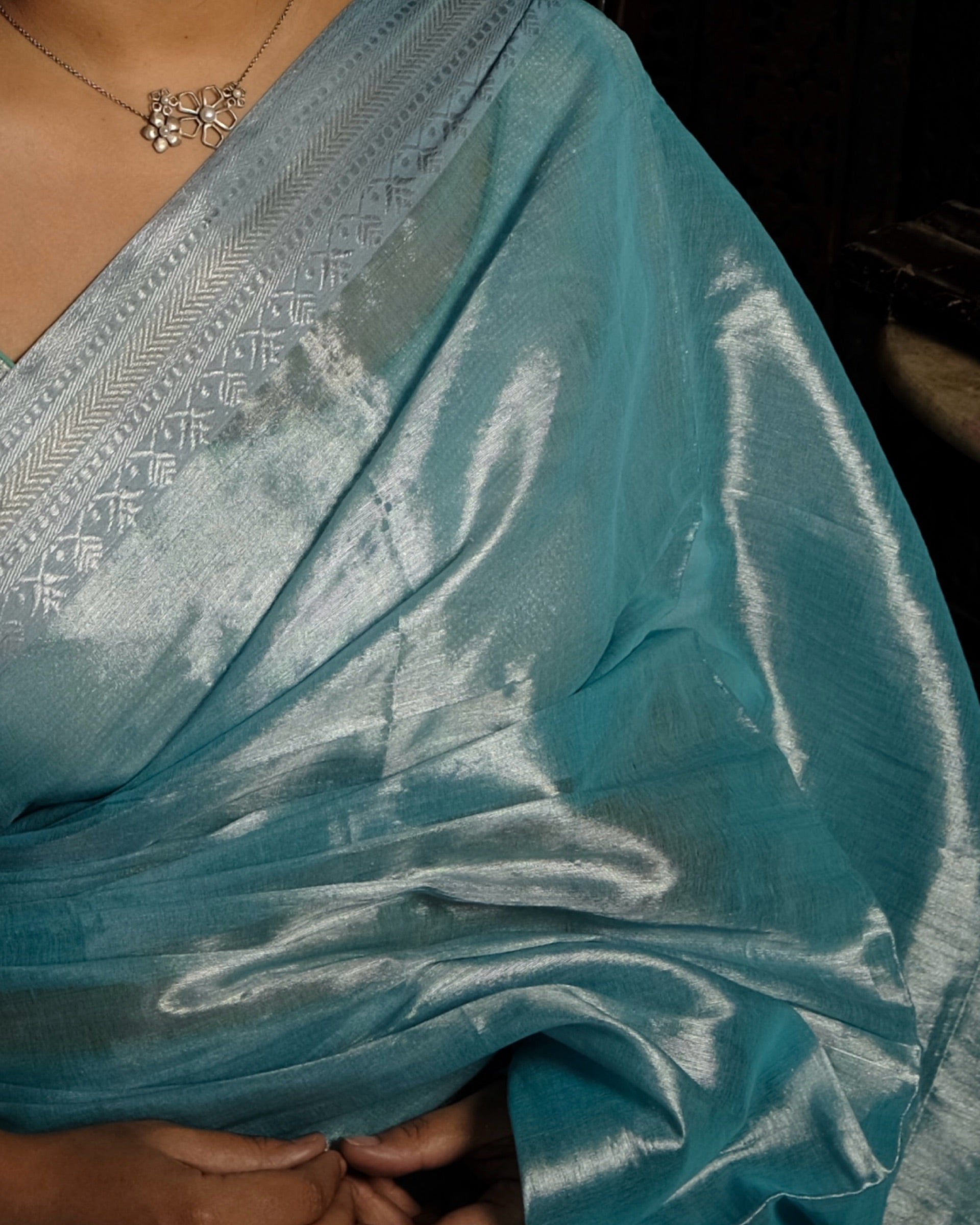 Asmaani blue tissue saree crafted in soft mulmul cotton with elegant border