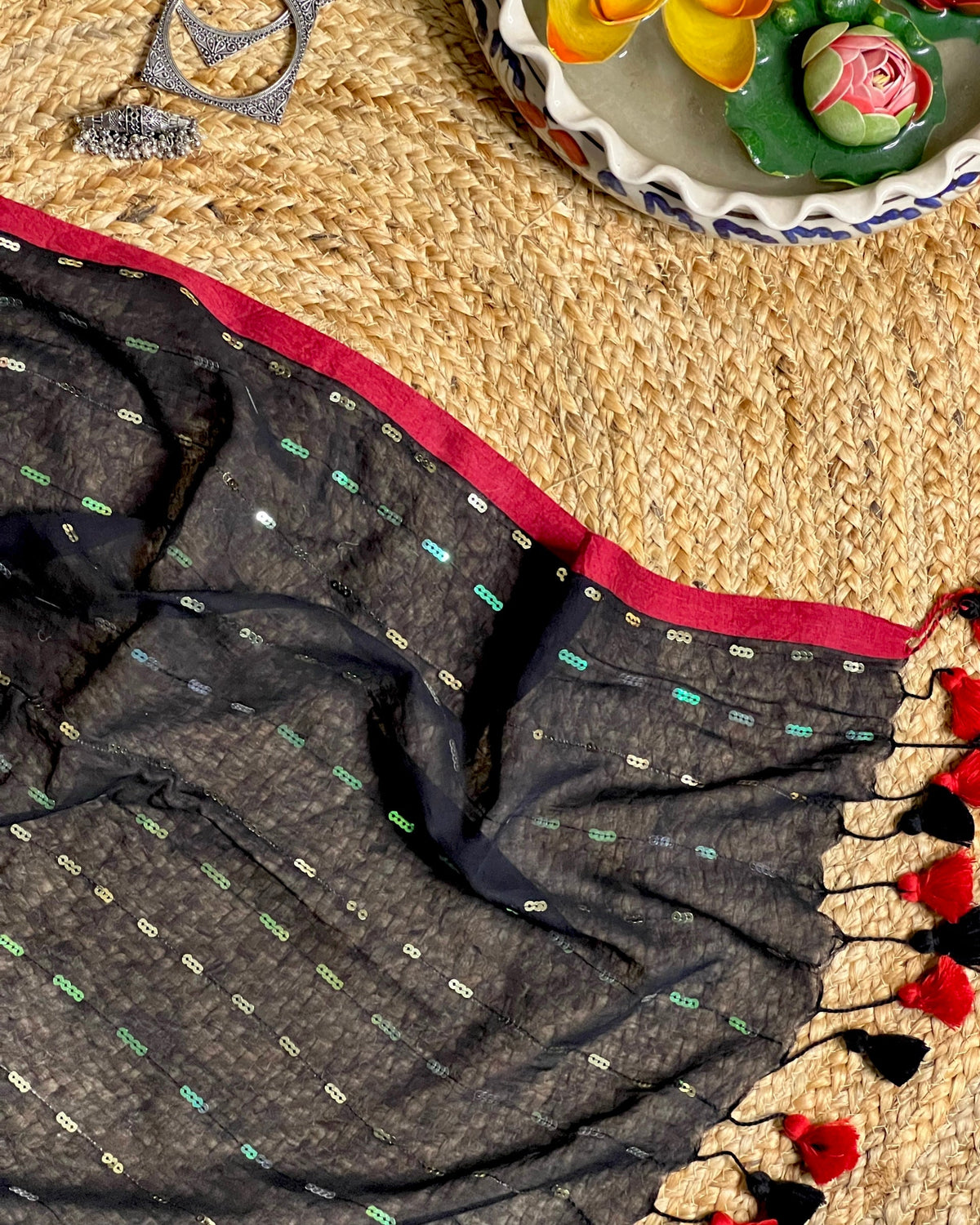 Kohl Magique black saree crafted with breathable fabric and festive styling