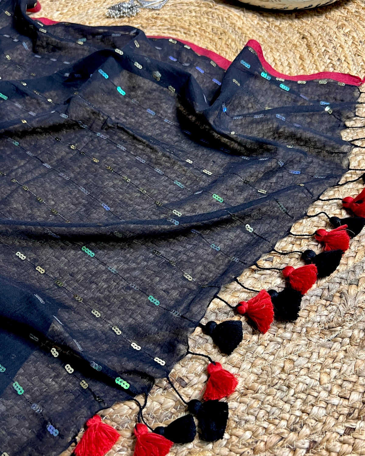 Designer black mulmul cotton saree with delicate sequins work for parties and celebrations