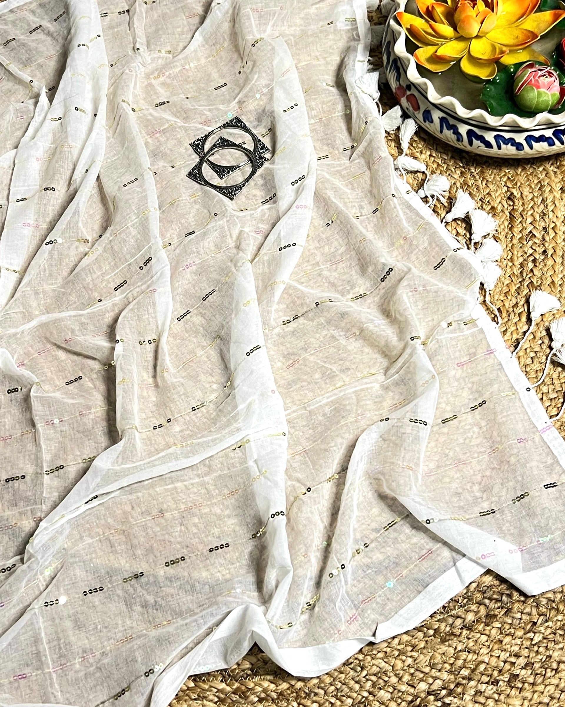 Shop AaMe White Sparkle saree in breathable white mulmul cotton with sequin work