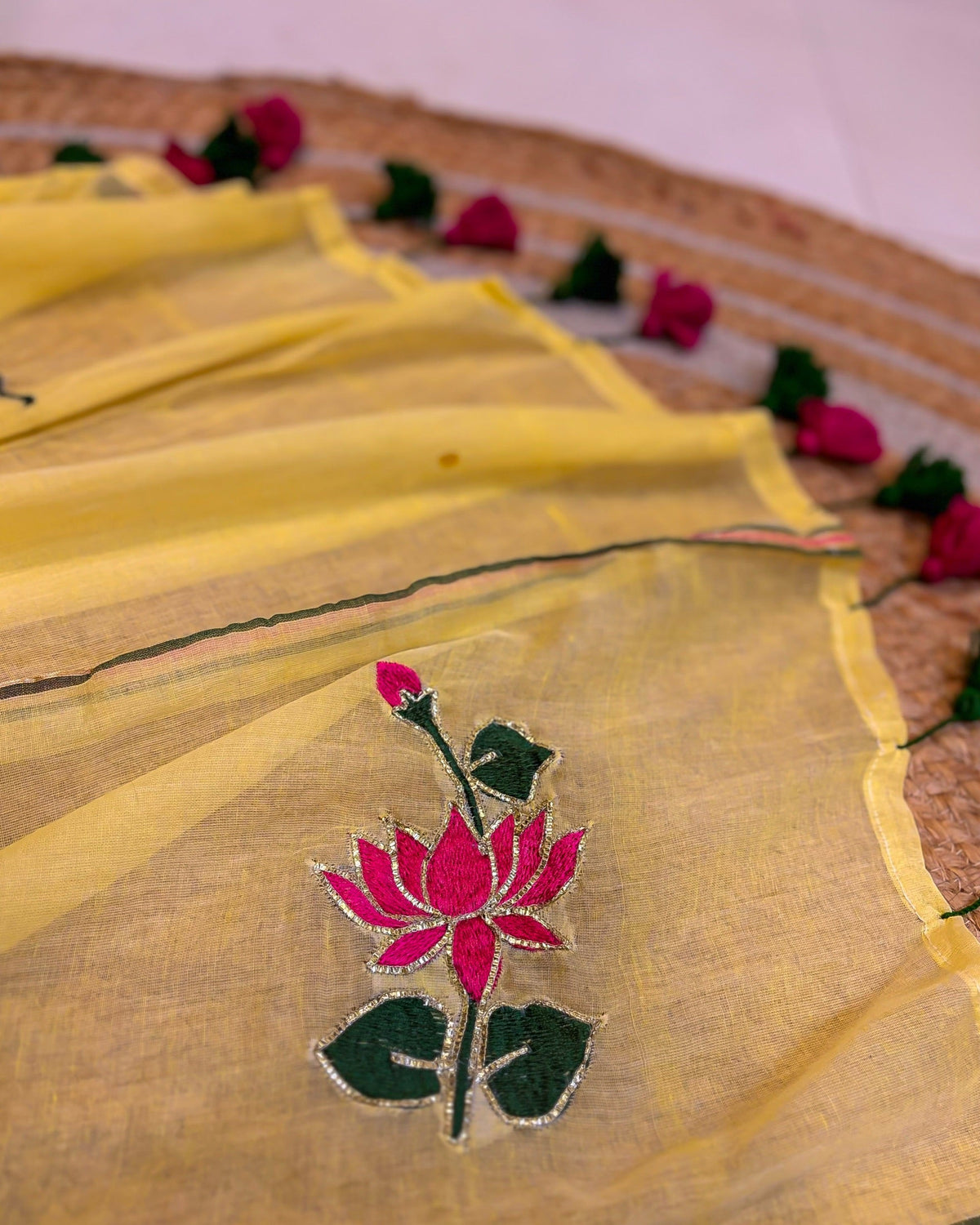 Yellow mulmul saree with lotus embroidery soft and airy drape