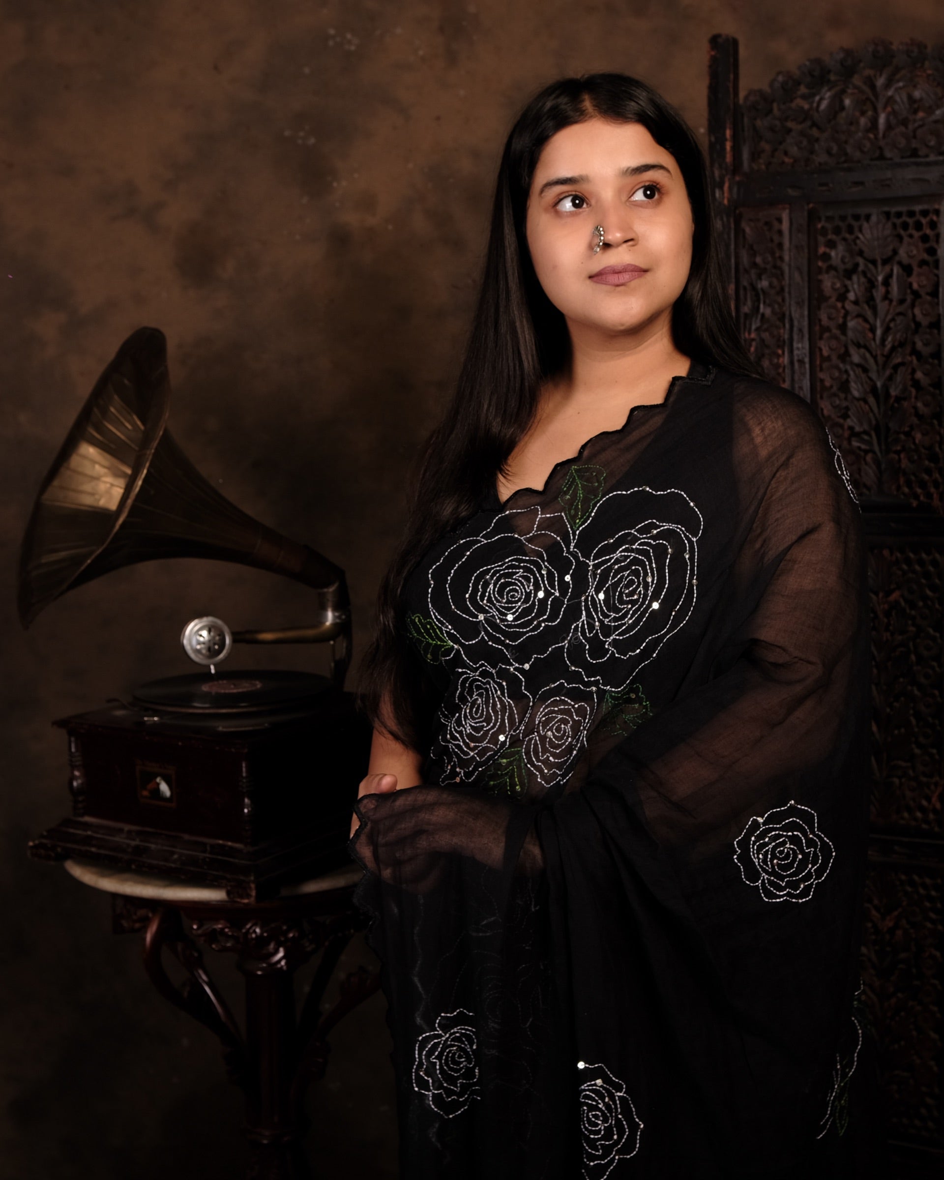 Soft and comfortable light weight black mulmul cotton Shopaame saree with rose embroidery sequins embellished.