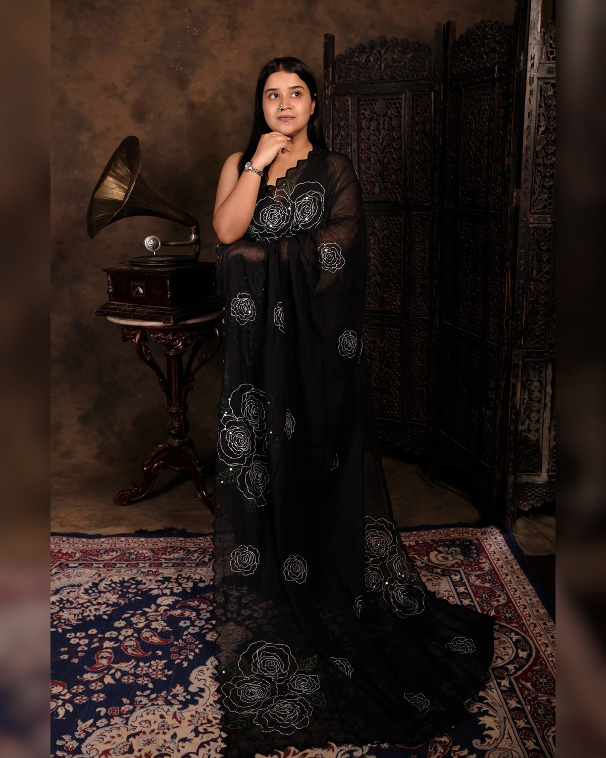 Comfortable light weight black mulmul cotton Shopaame saree with rose embroidery sequins embellished ,good for day time wear.