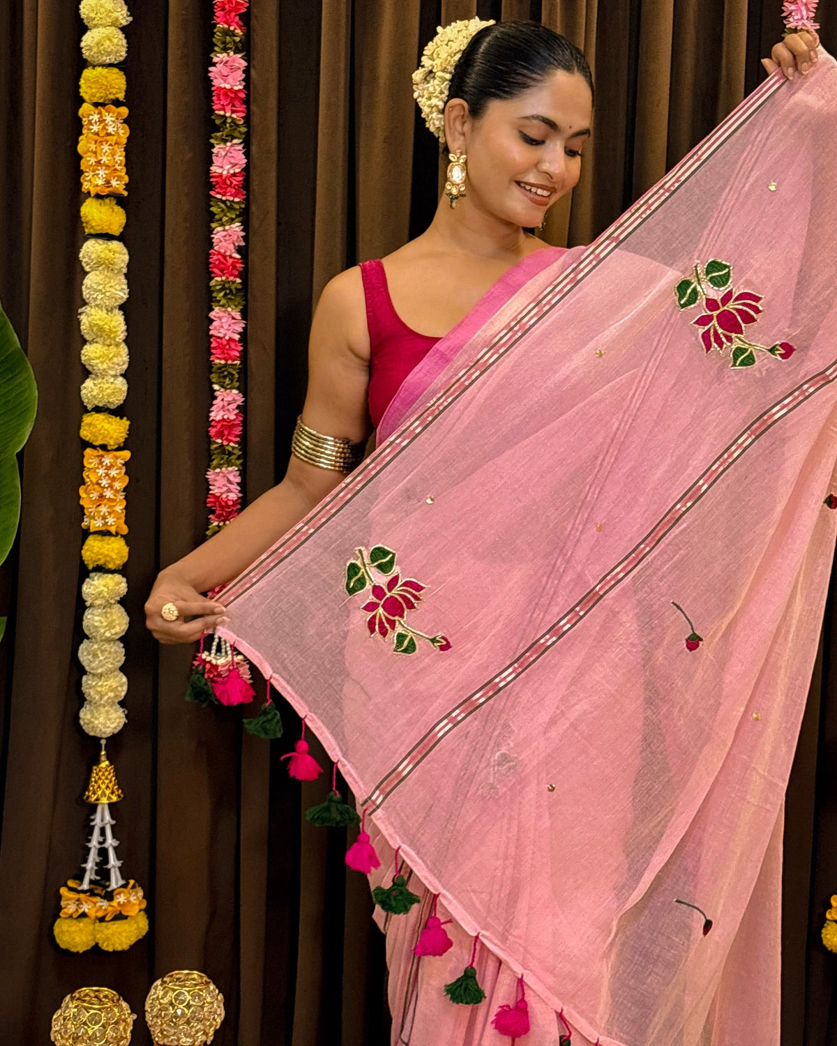 Hand embroidered pink mulmul cotton saree with elegant lotus design