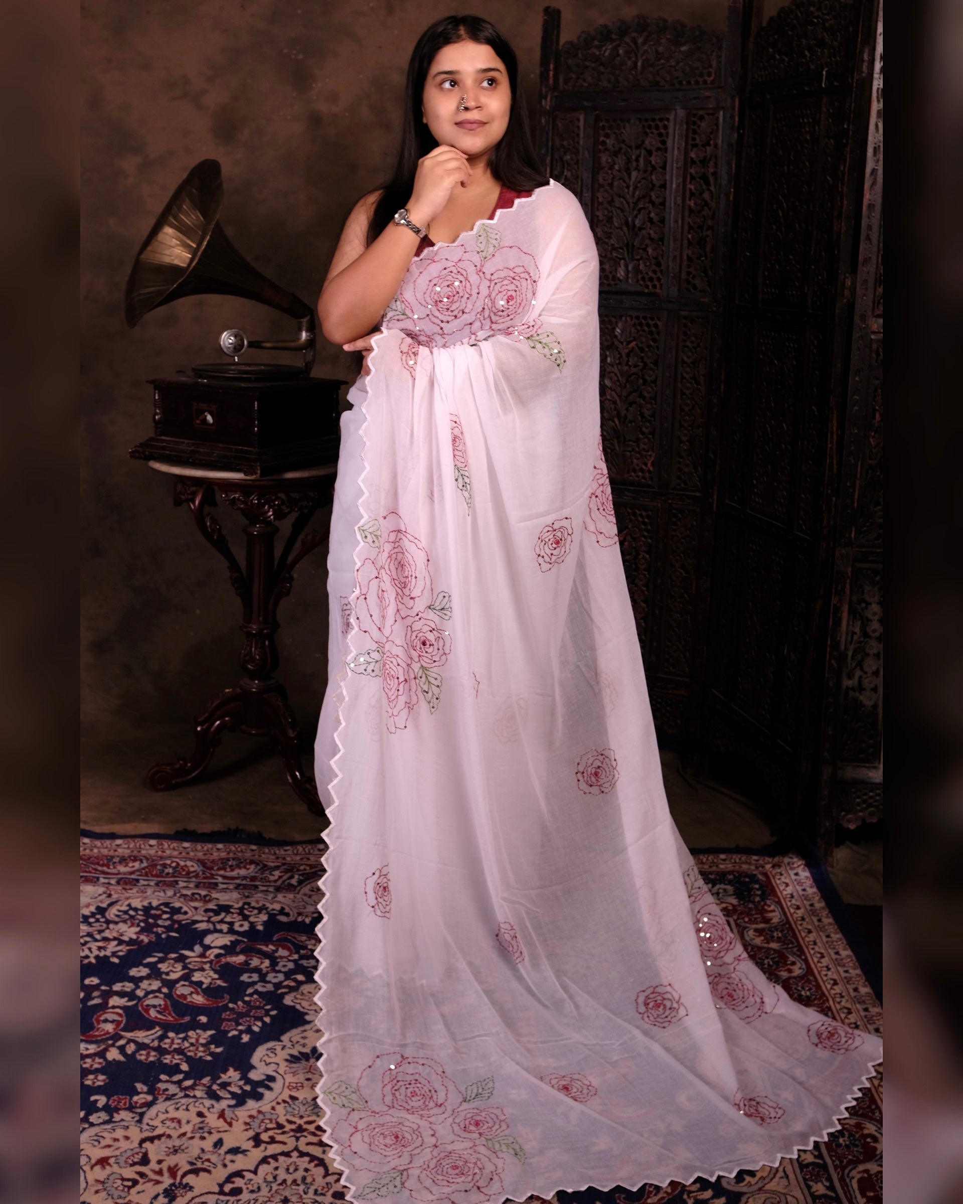 White cotton saree with delicate rose sequins work, a breathable festive saree perfect for summer comfort.