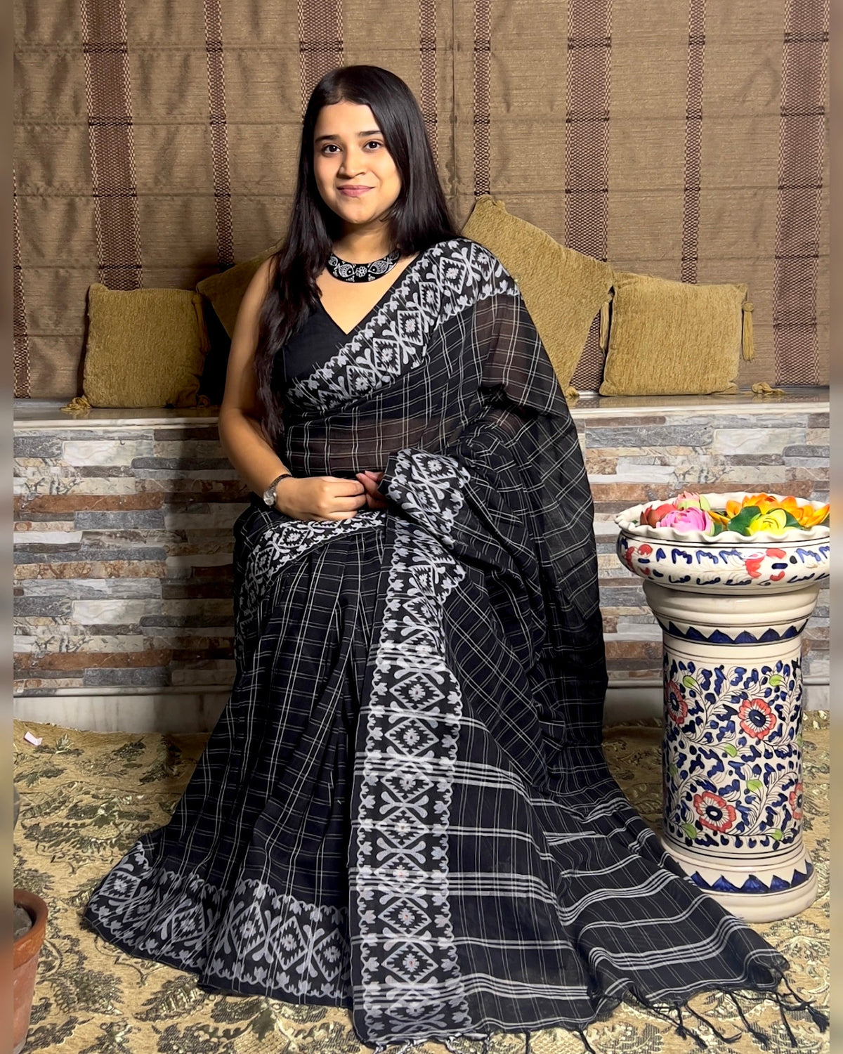 Black Khaadi cotton sari with Jamdani white border and checks body for auspicious festivities and pujo