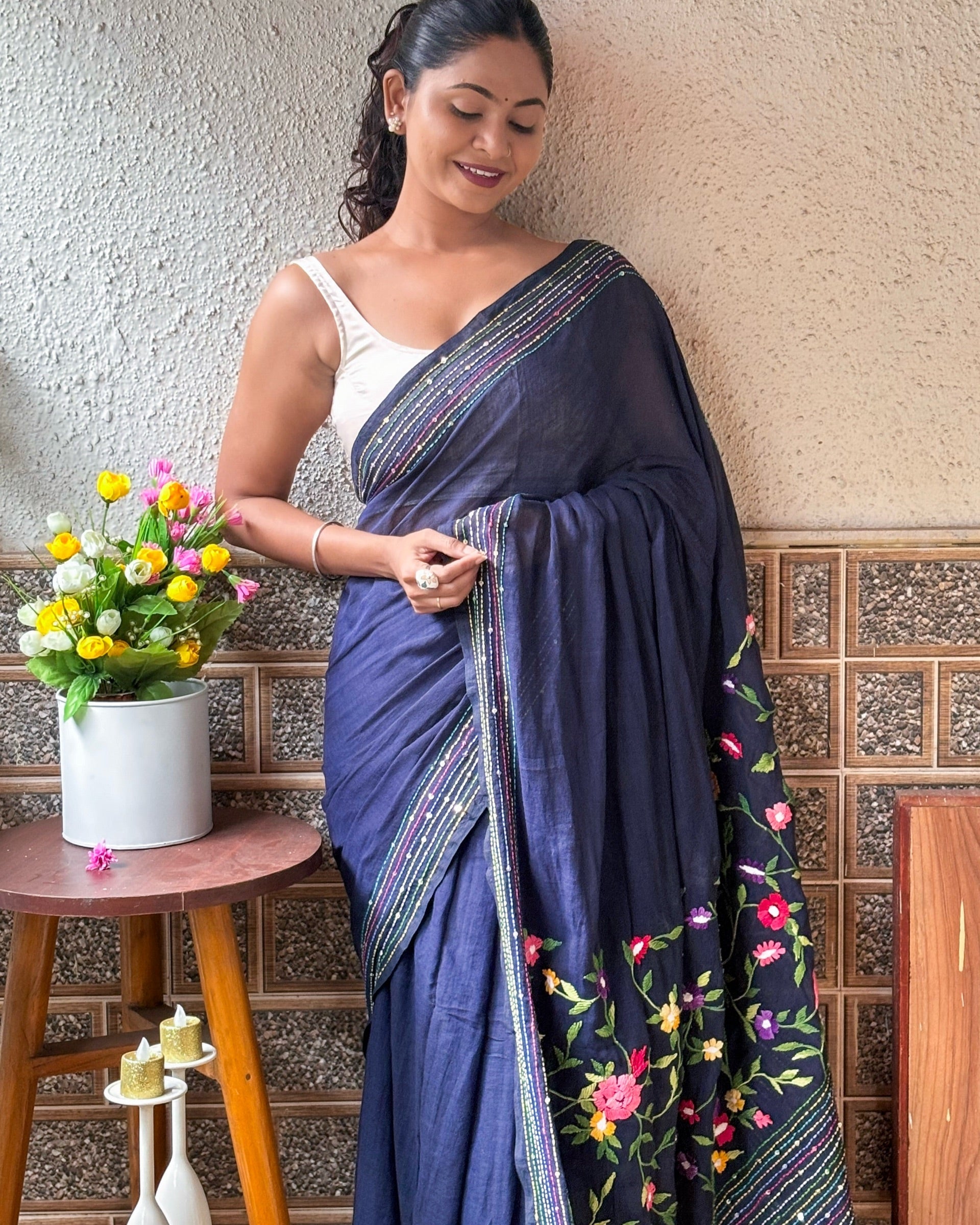 Navy embroidered cotton saree perfect for evening gatherings