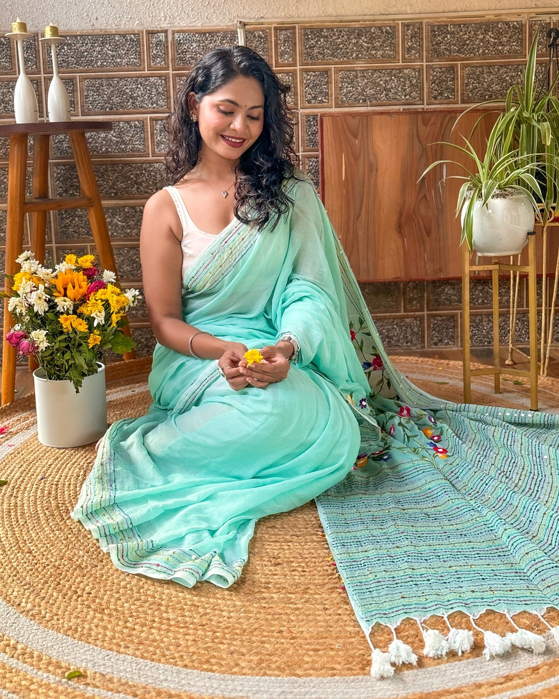 Hand embroidered green mulmul saree elegant and comfortable drape