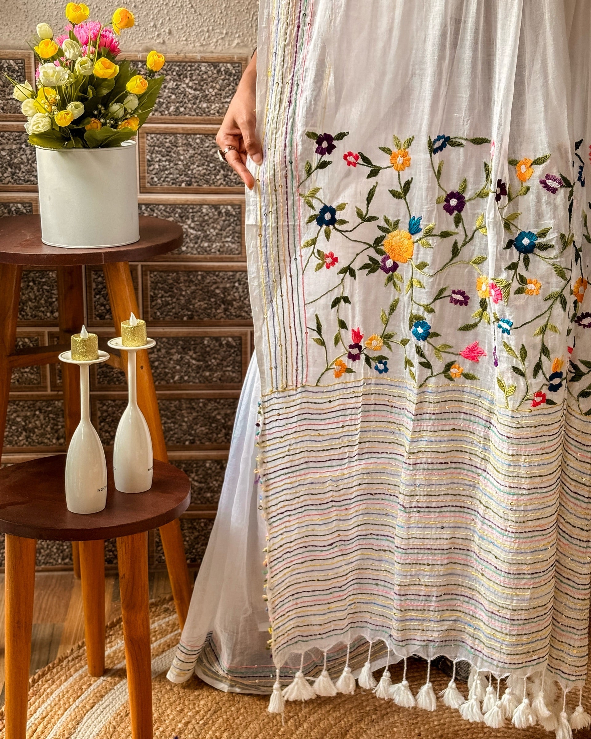 Close-up of fine floral embroidery on Frosted Floral Muse white saree