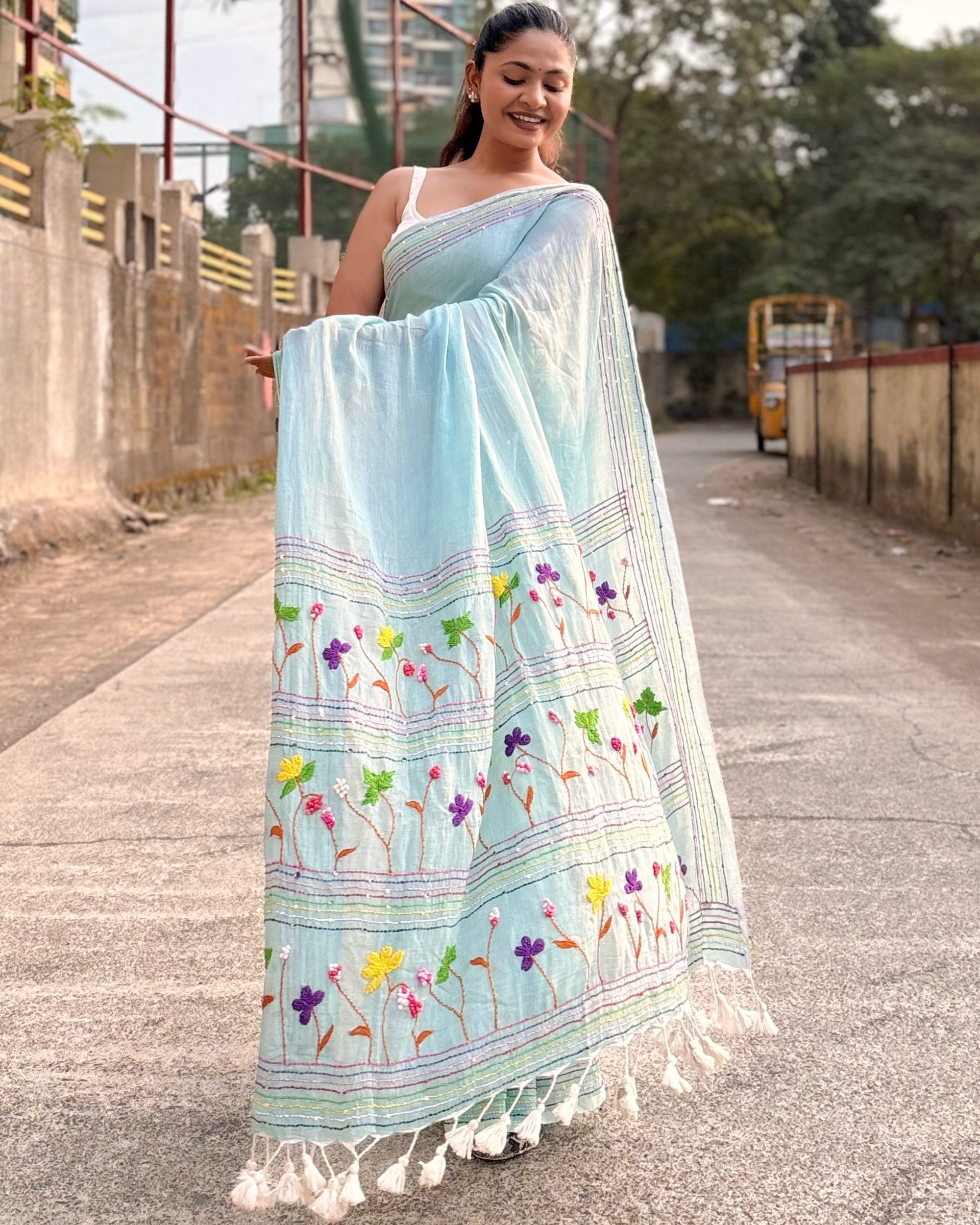 Cyan mulmul cotton saree with fine embroidery and lightweight texture