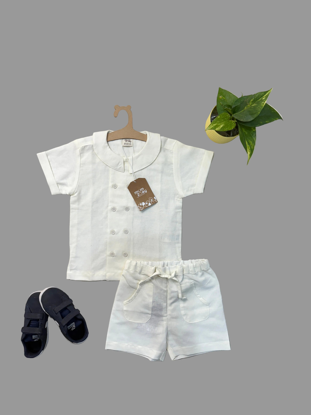 Oslo organic cotton-linen kids shirt styled outfit flat lay with shorts and sandals on light background