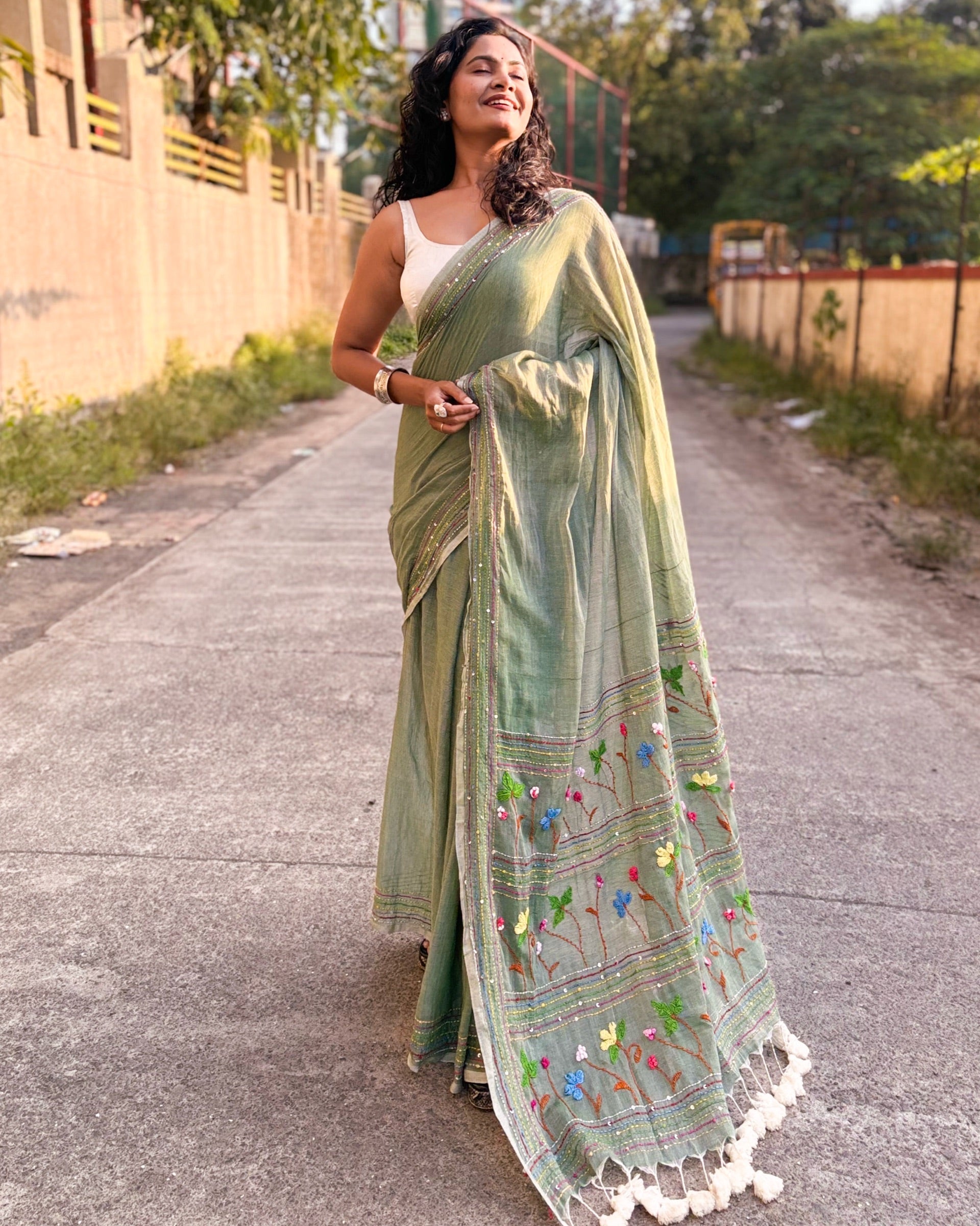 Hand embroidered green mulmul cotton saree soft and airy drape