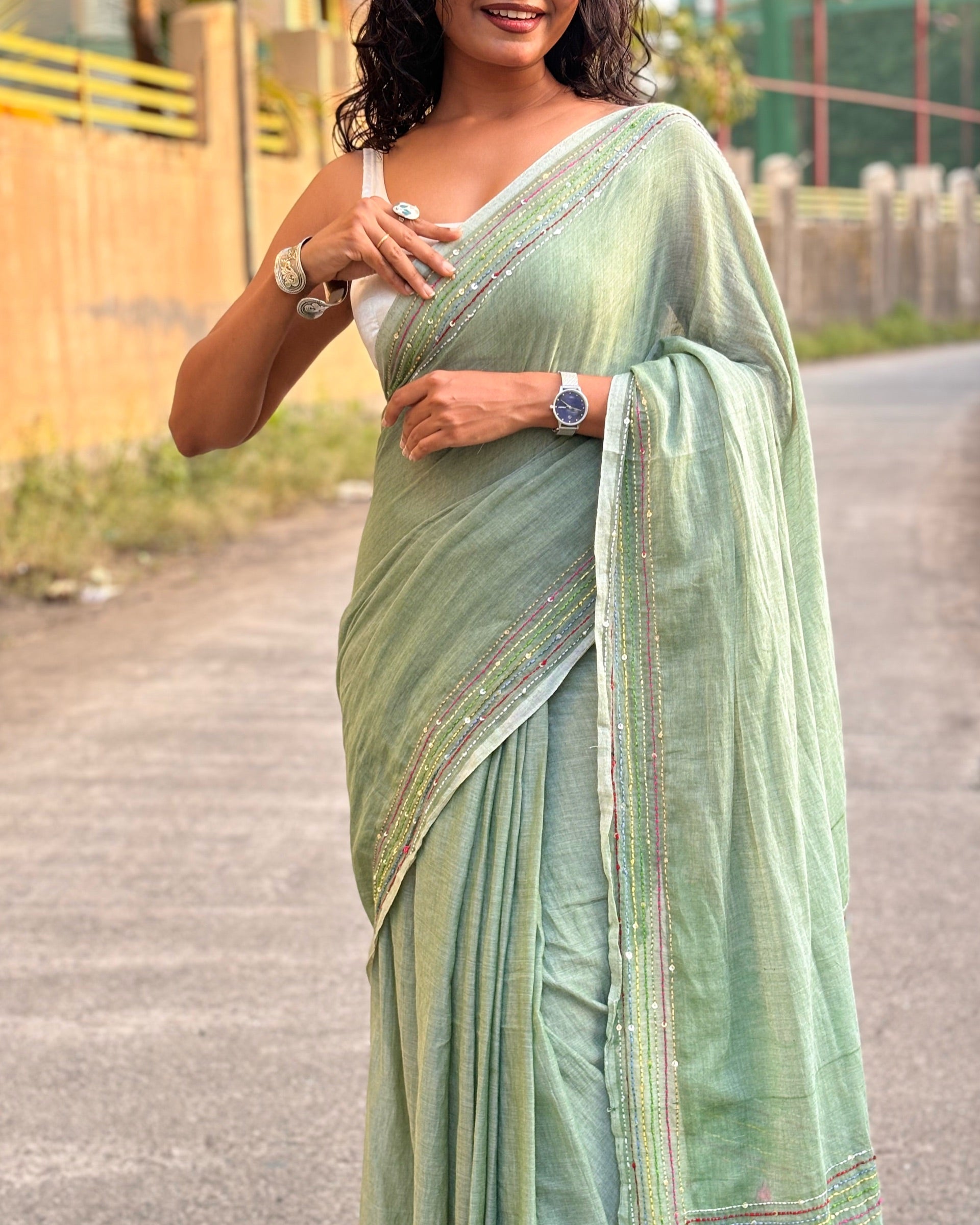 Soft mulmul cotton saree in green color with fine embroidery