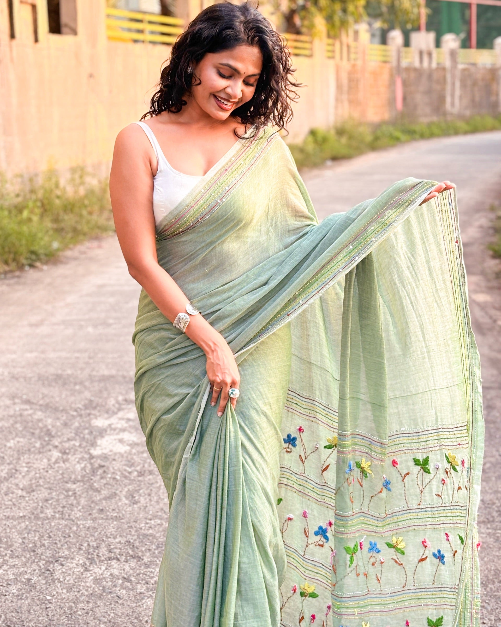 Lightweight green embroidered mulmul saree for summer wear