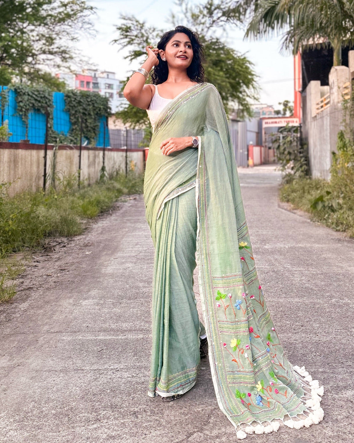 Lightweight green mulmul saree comfortable and easy to drape